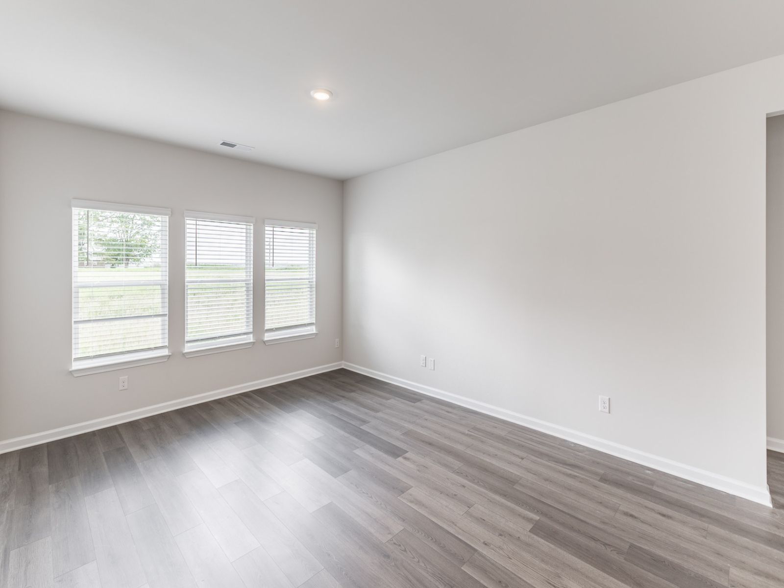 Great Room in the Newport floorplan with the Balanced Dark interior package.