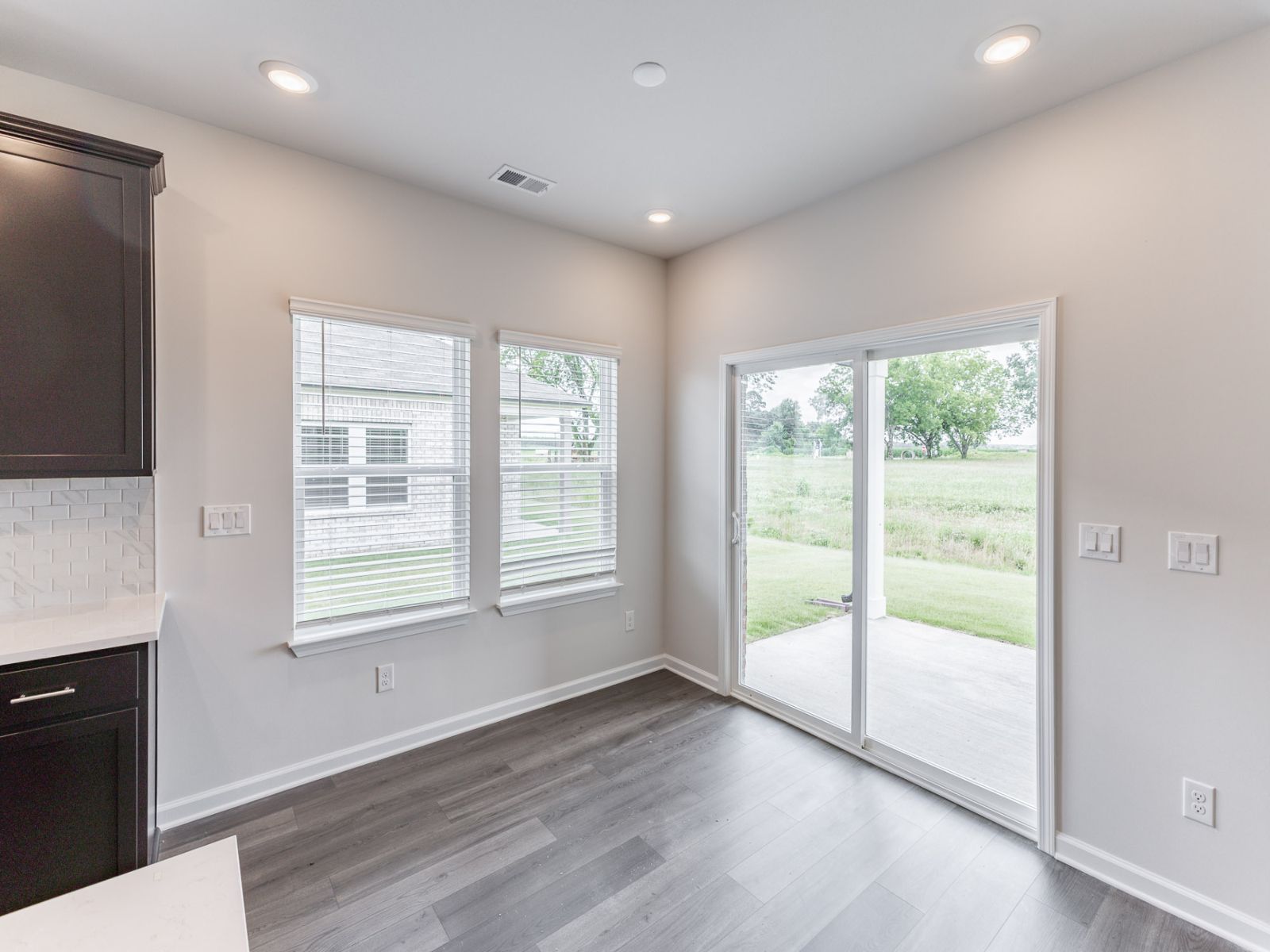 Great Room in the Newport floorplan with the Balanced Dark interior package.
