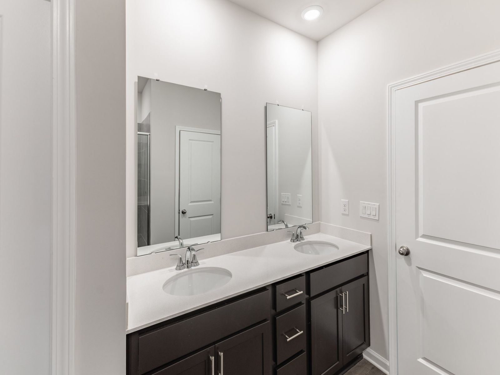 Primary Bathroom in the Newport floorplan with the Balanced Dark interior package.