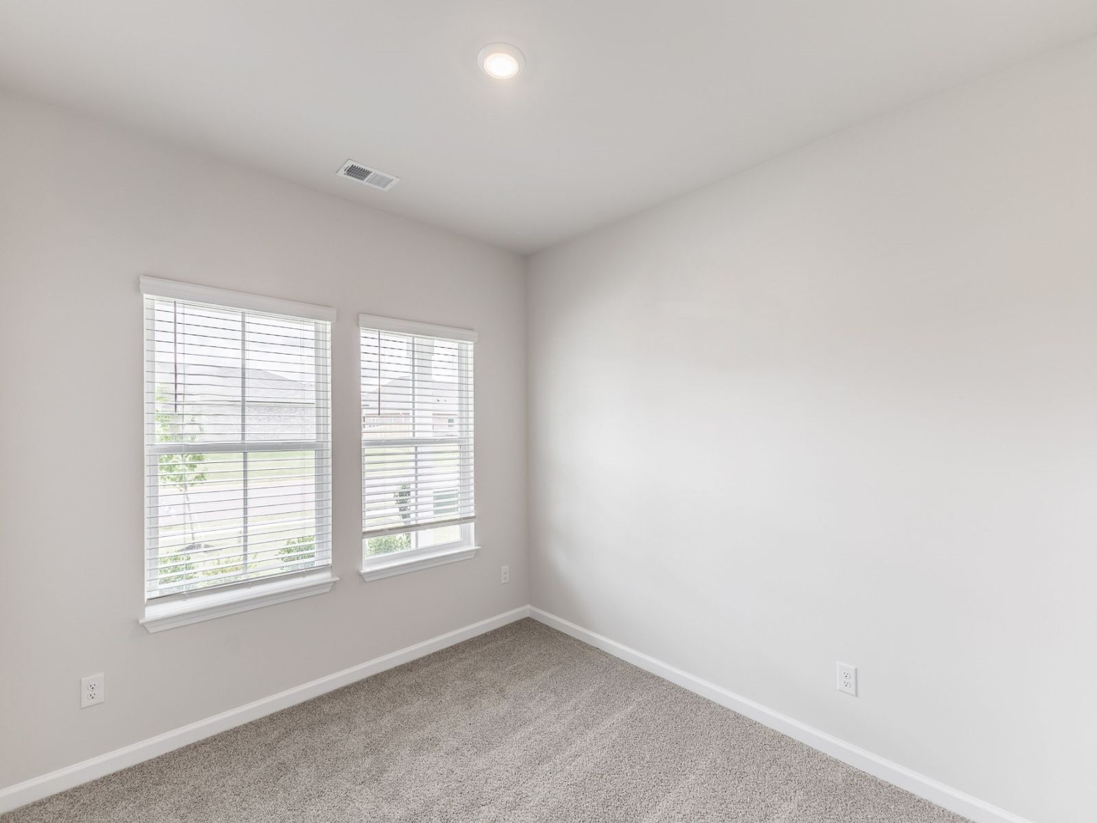 Secondary Bedroom in the Newport floorplan with the Balanced Dark interior package.
