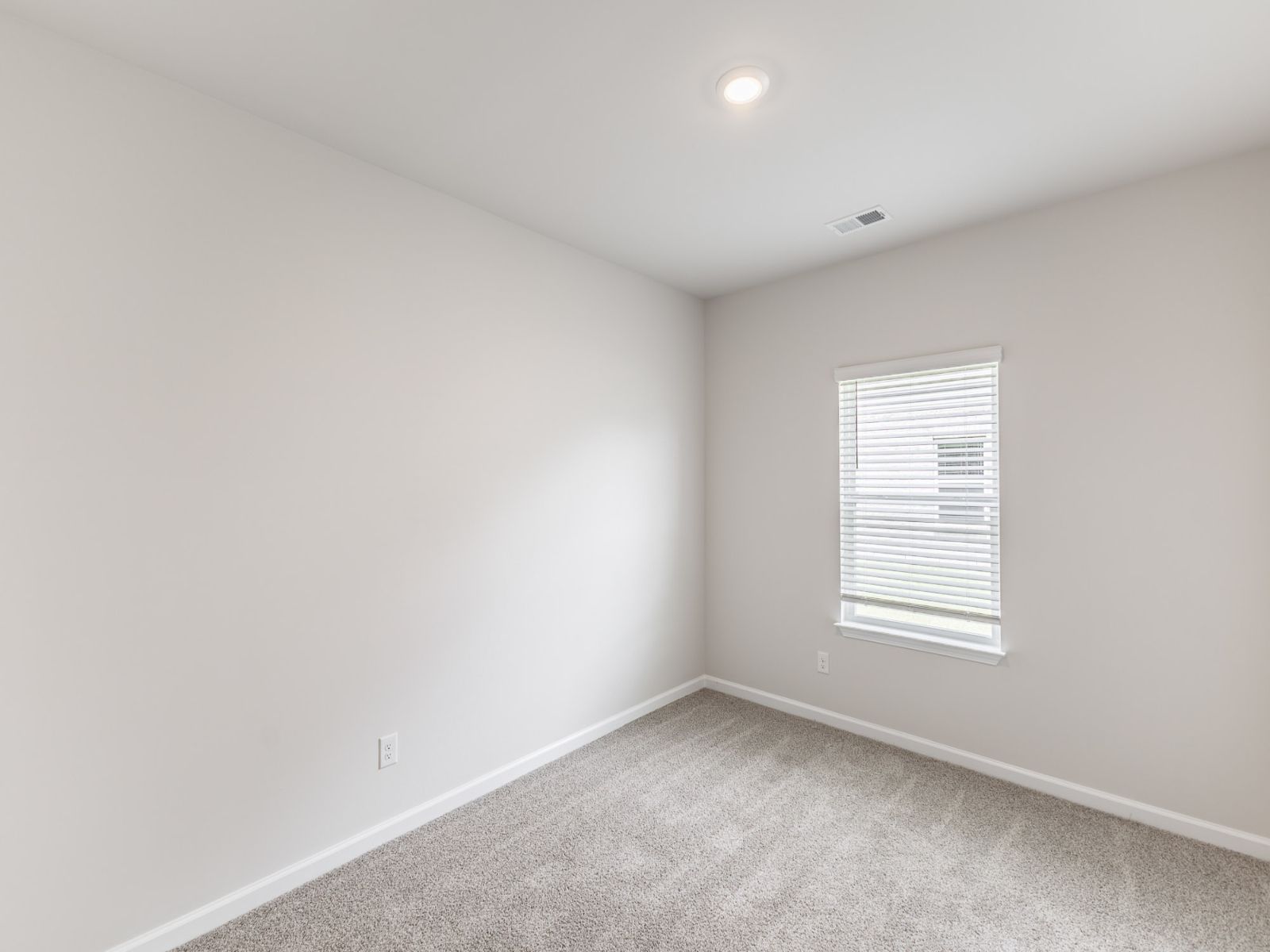 Secondary Bedroom in the Newport floorplan with the Balanced Dark interior package.