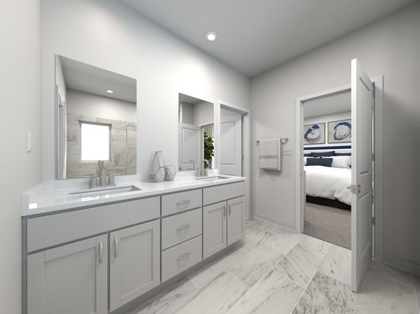 The primary bathroom offers dual vanity sinks and a walk-in shower.