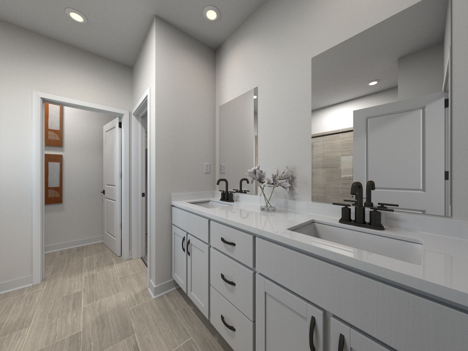 The primary bathroom offers dual vanity sinks and a walk-in shower.