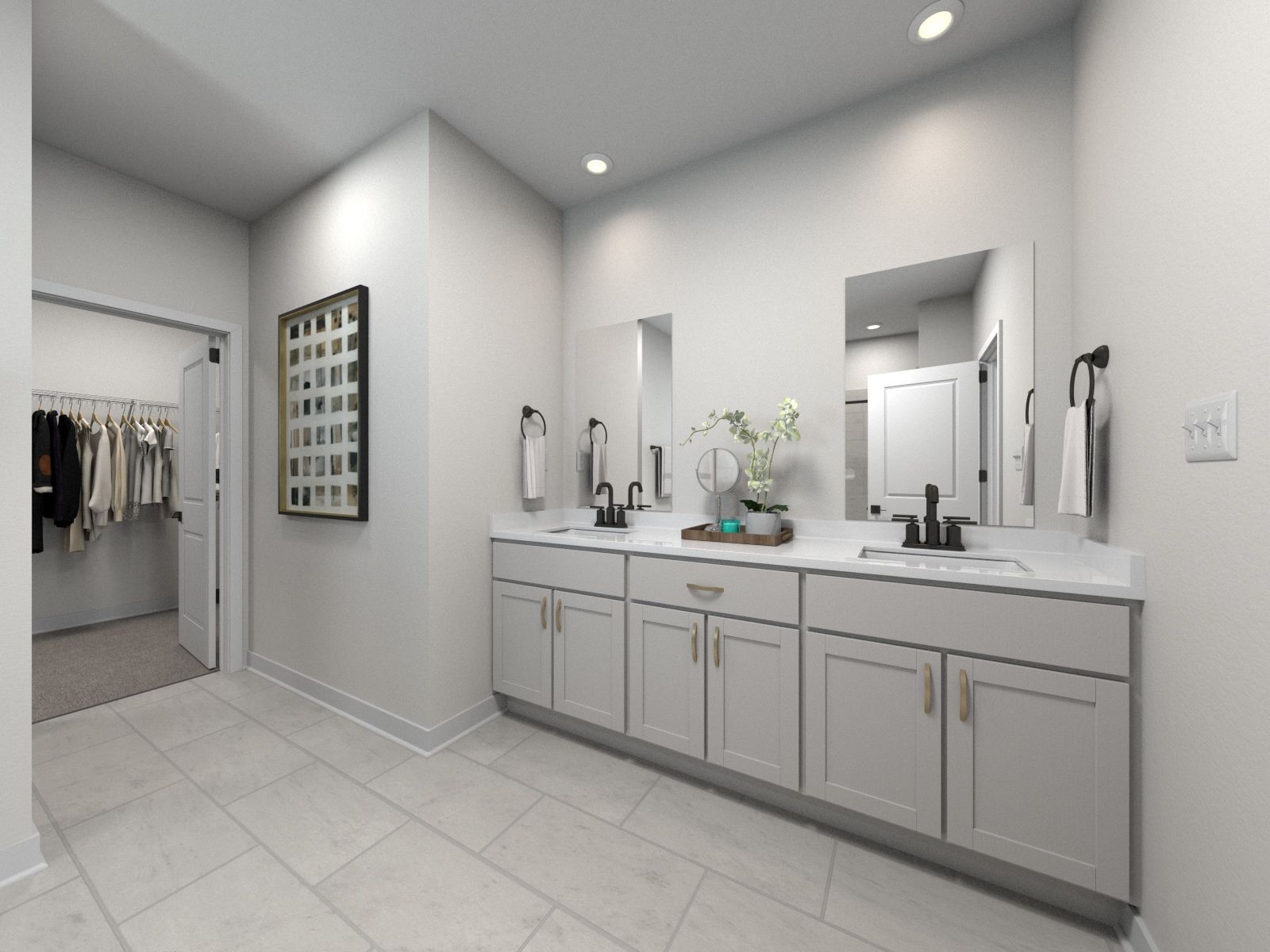 The primary bathroom offers dual vanity sinks and a walk-in shower.