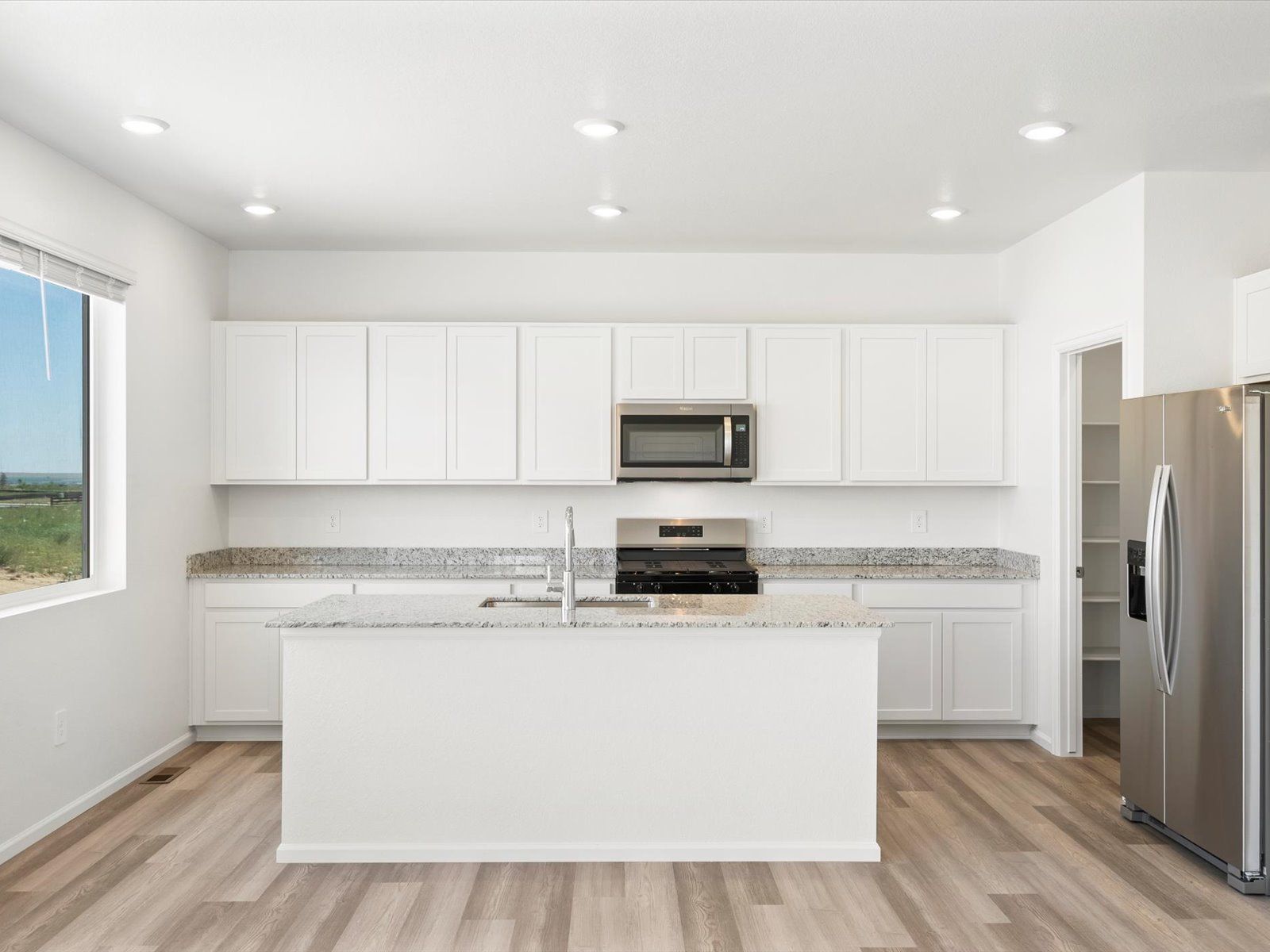 The Monarch floorplan image taken at a Meritage Homes community in Johnstown, CO.