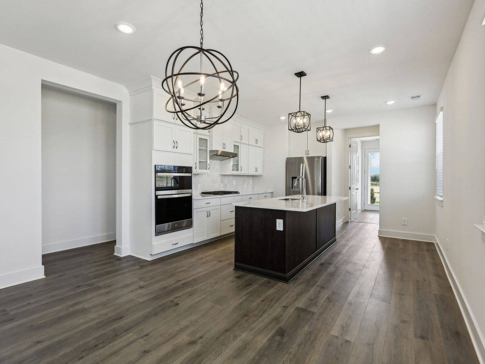 The open-concept floorplan allows for an easy flow between the kitchen and dining areas.