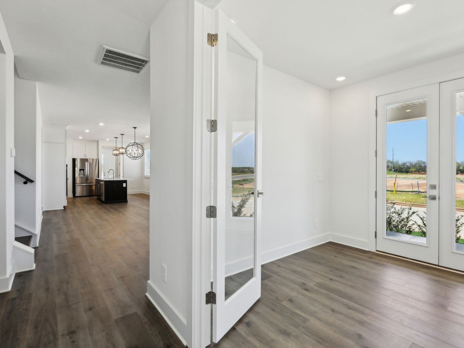 Skip your commute and turn the flex room into an at-home office.
