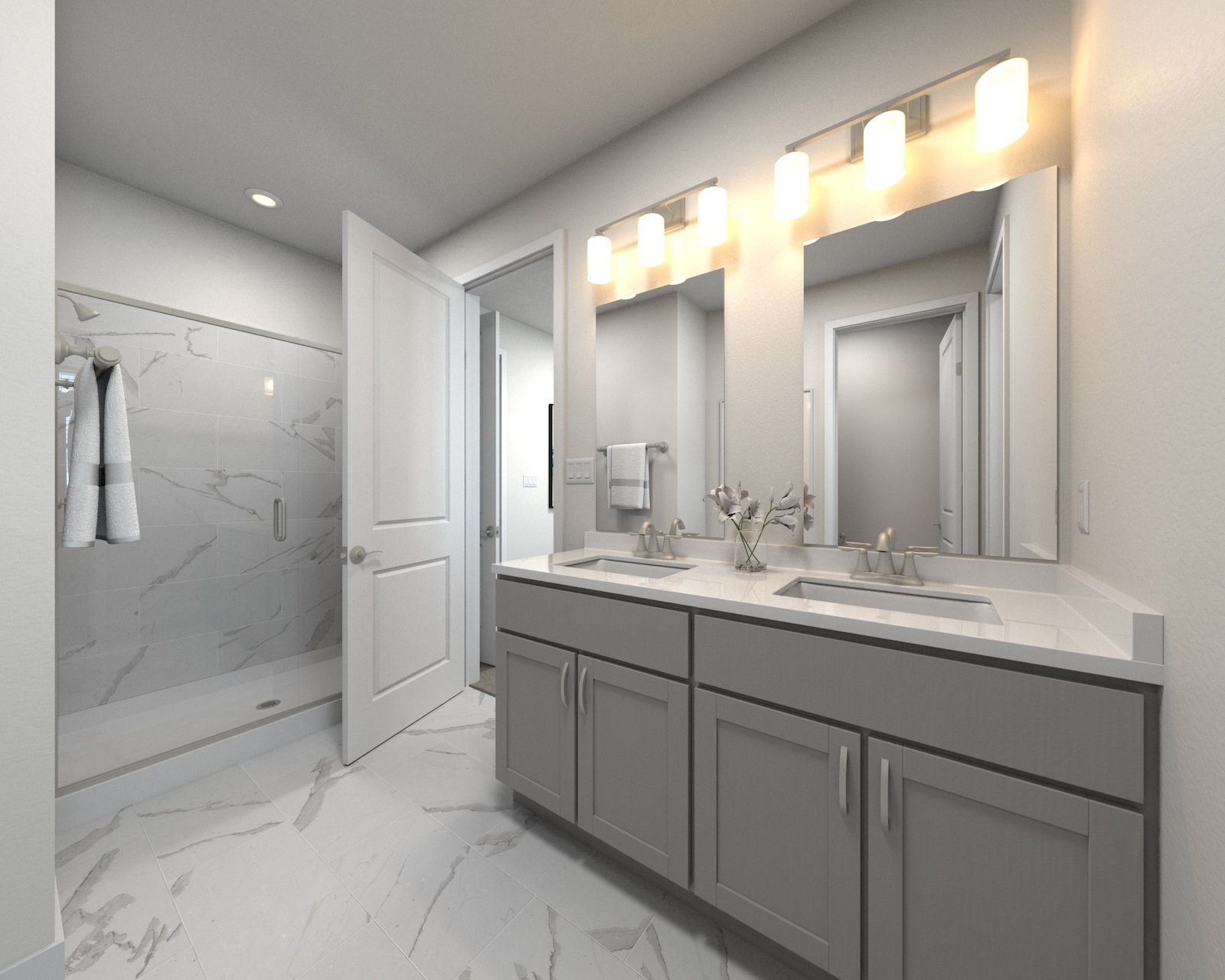 The primary bathroom offers dual vanity sinks and a walk-in shower.