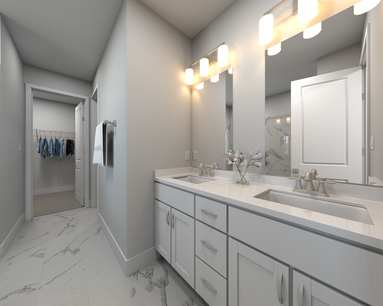 The primary bedroom offers dual vanity sinks and a walk-in shower.