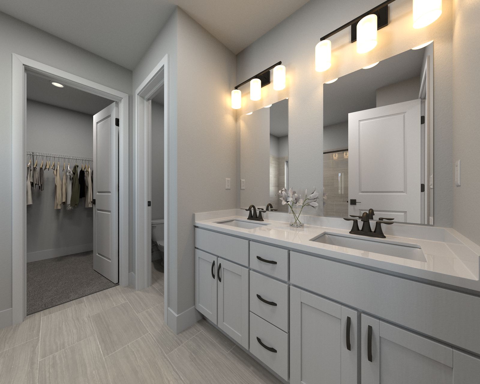 The primary bathroom offers dual vanity sinks and a walk-in shower.