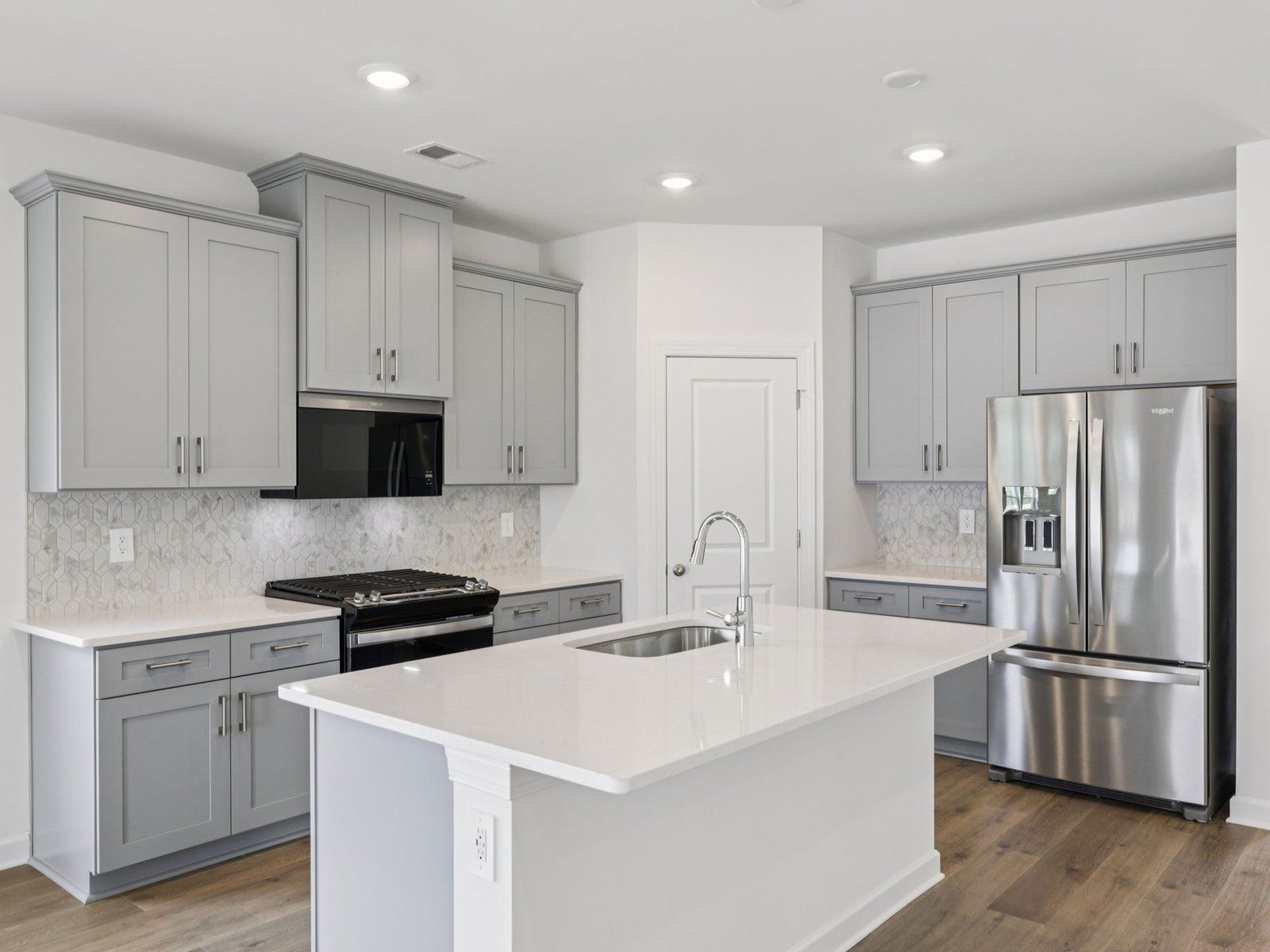 The oversized kitchen island can make your weekly meal-prep much easier.