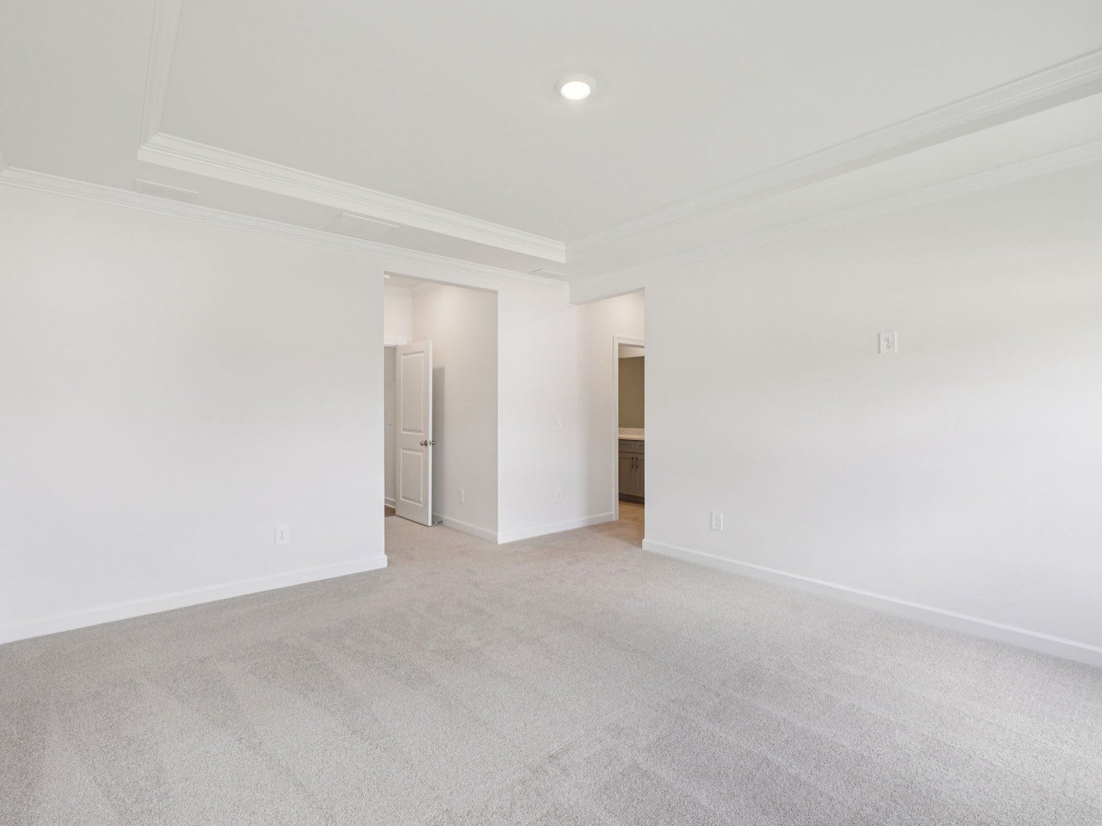 The primary bedroom conveniently leads to your own personal ensuite.