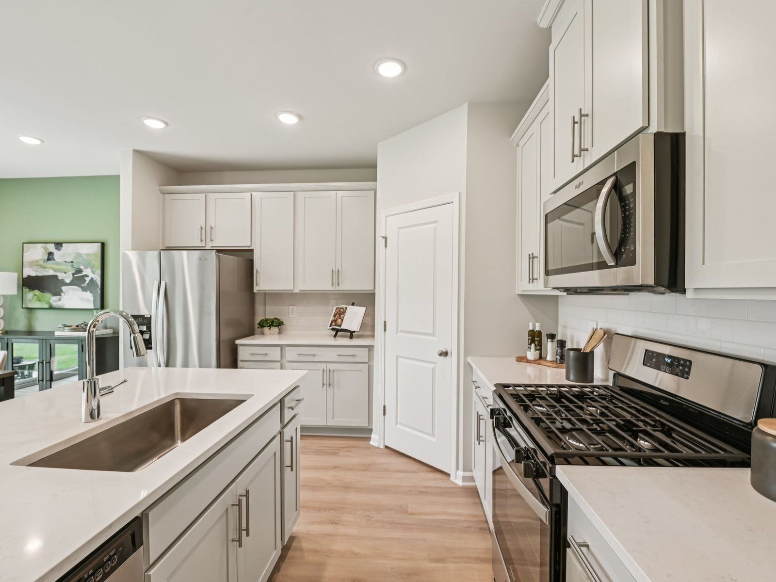 Kitchen in the Chatham floorplan at a Meritage Homes community in Mebane, NC.