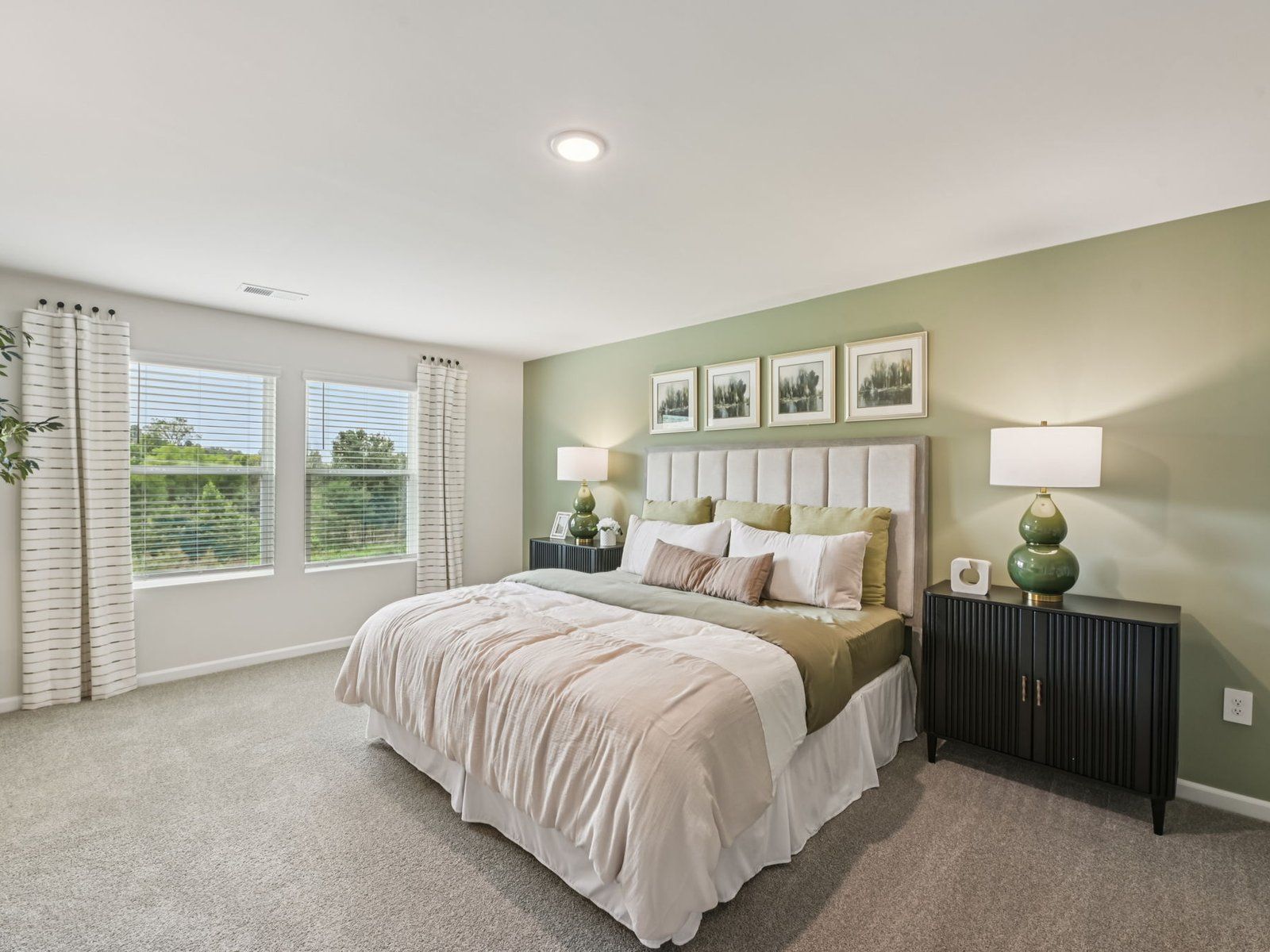 Primary bedroom in the Chatham floorplan at a Meritage Homes community in Mebane, NC.