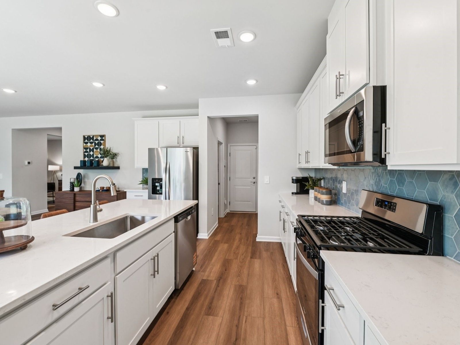 Kitchen in the Taylorsville floorplan at a Meritage Homes community in Mebane, NC.