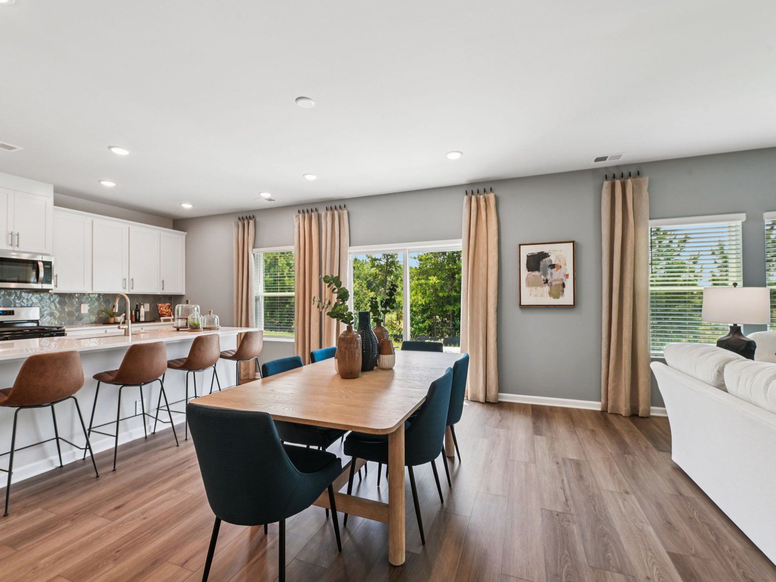 Dining area in the Taylorsville floorplan at a Meritage Homes community in Mebane, NC.