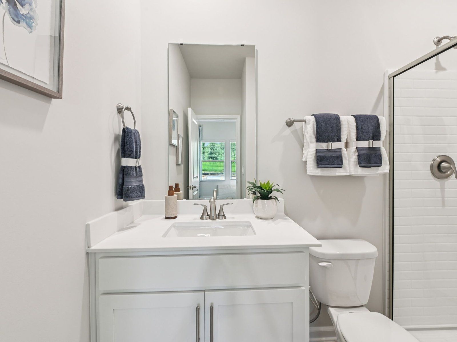 Secondary bathroom in the Taylorsville floorplan at a Meritage Homes community in Mebane, NC.