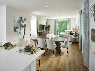 The Acadia Floorplan Great Room Modeled at Leyland Preserve.