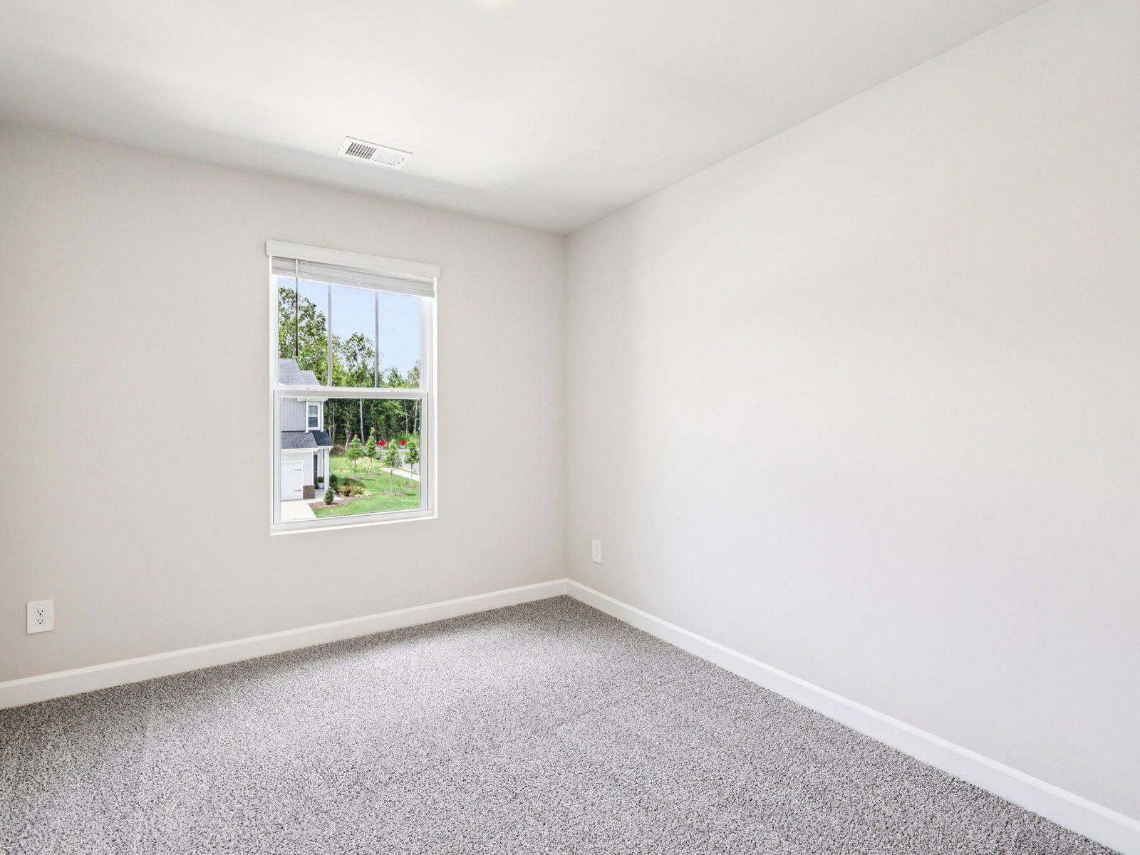 The secondary bedroom makes for a perfect home office.