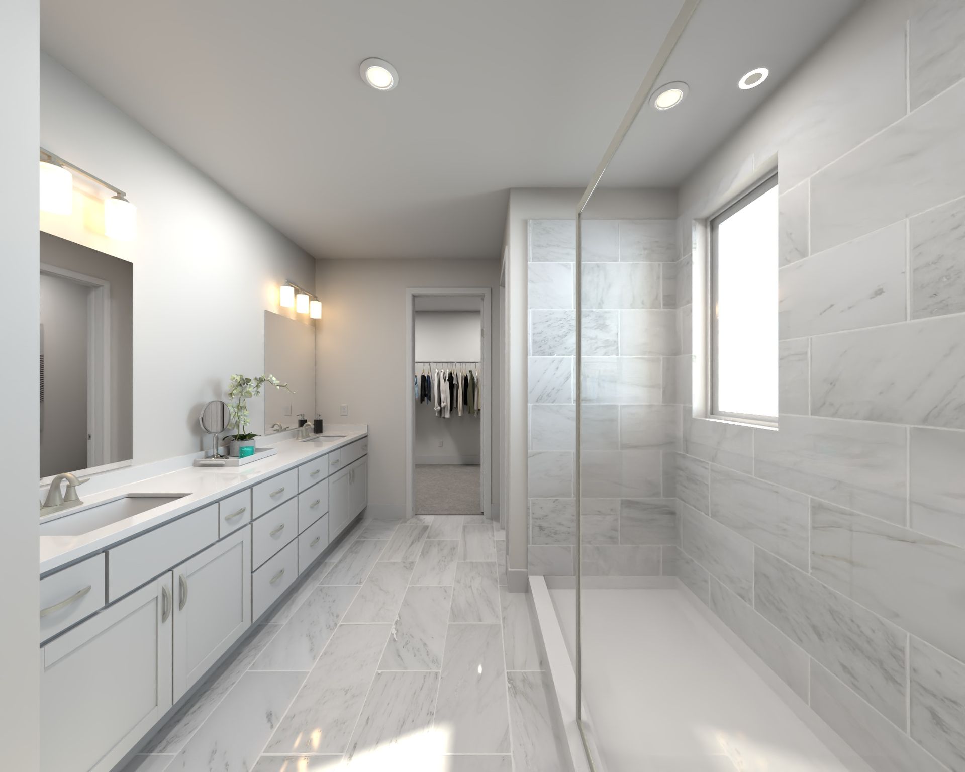 The primary bathroom offers dual vanity sinks and a walk-in shower.