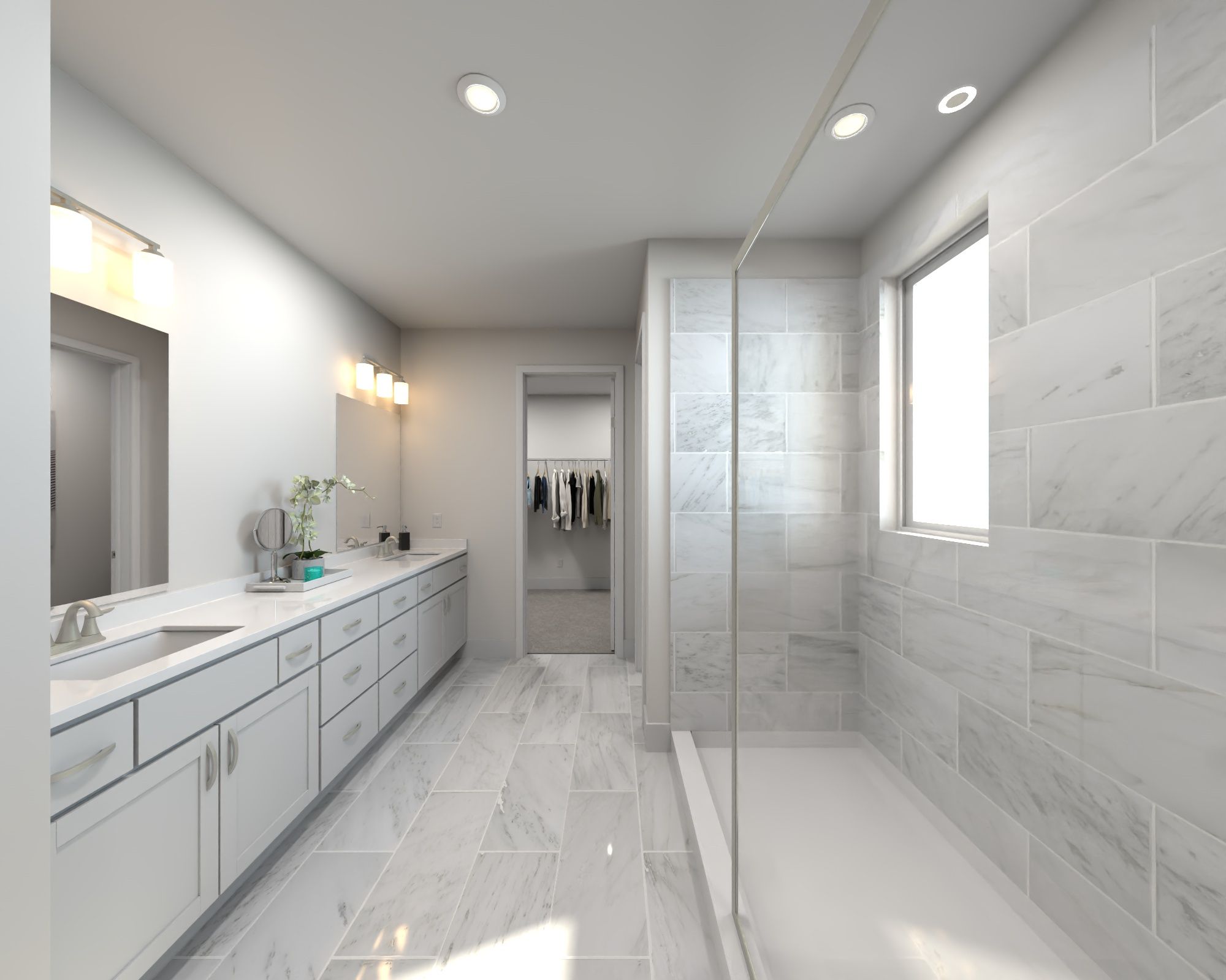 The primary bathroom offers dual vanity sinks and a walk-in shower.