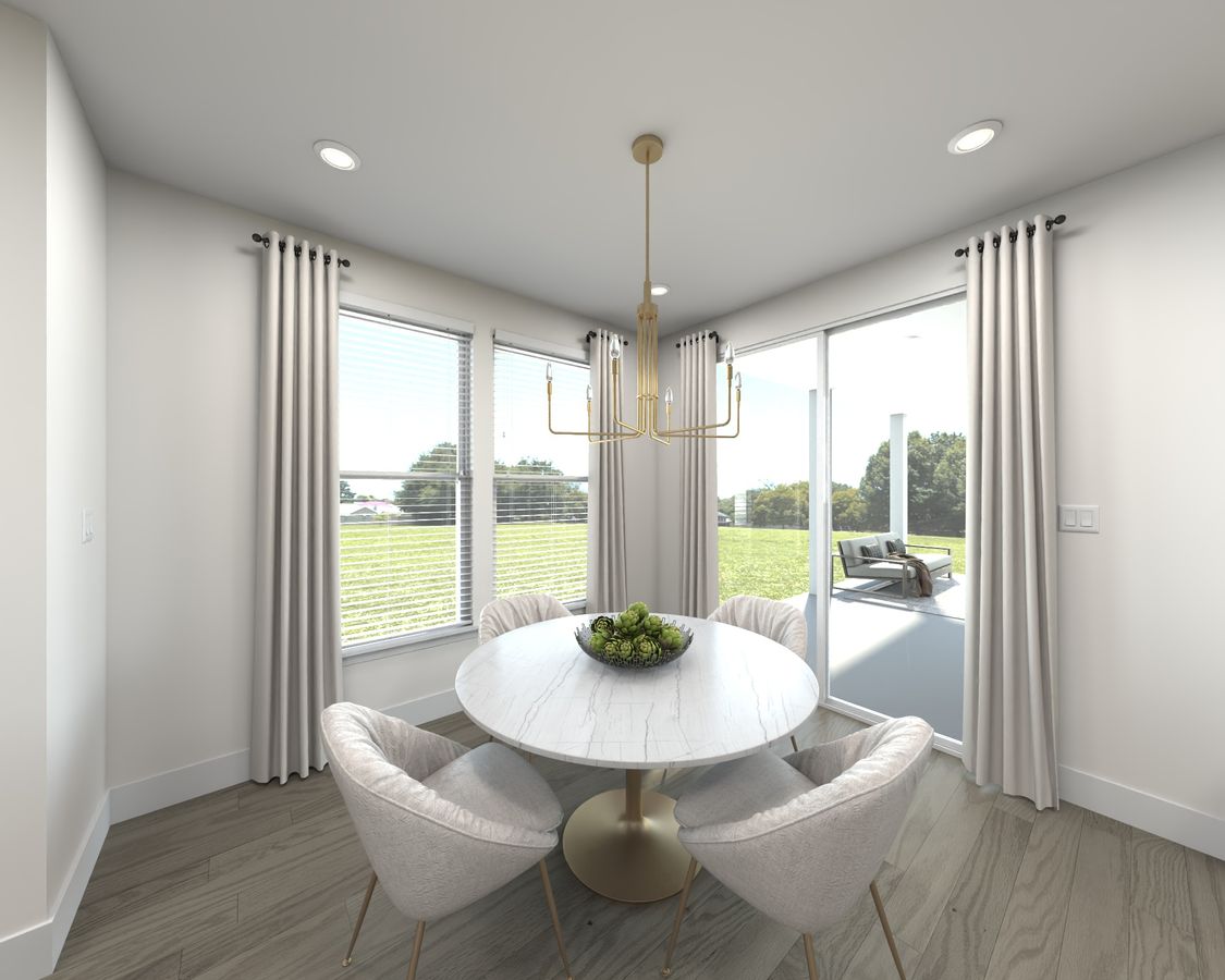 The open-concept floorplan allows for an easy flow between the kitchen and dining areas.