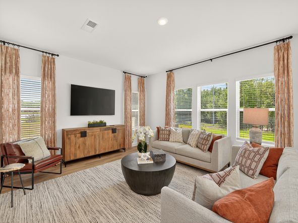 The great room is perfect for lounging or catching up with visitors.