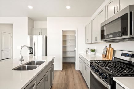 The Solitude floorplan interior image taken at a Meritage Homes Community in Tooele, UT.