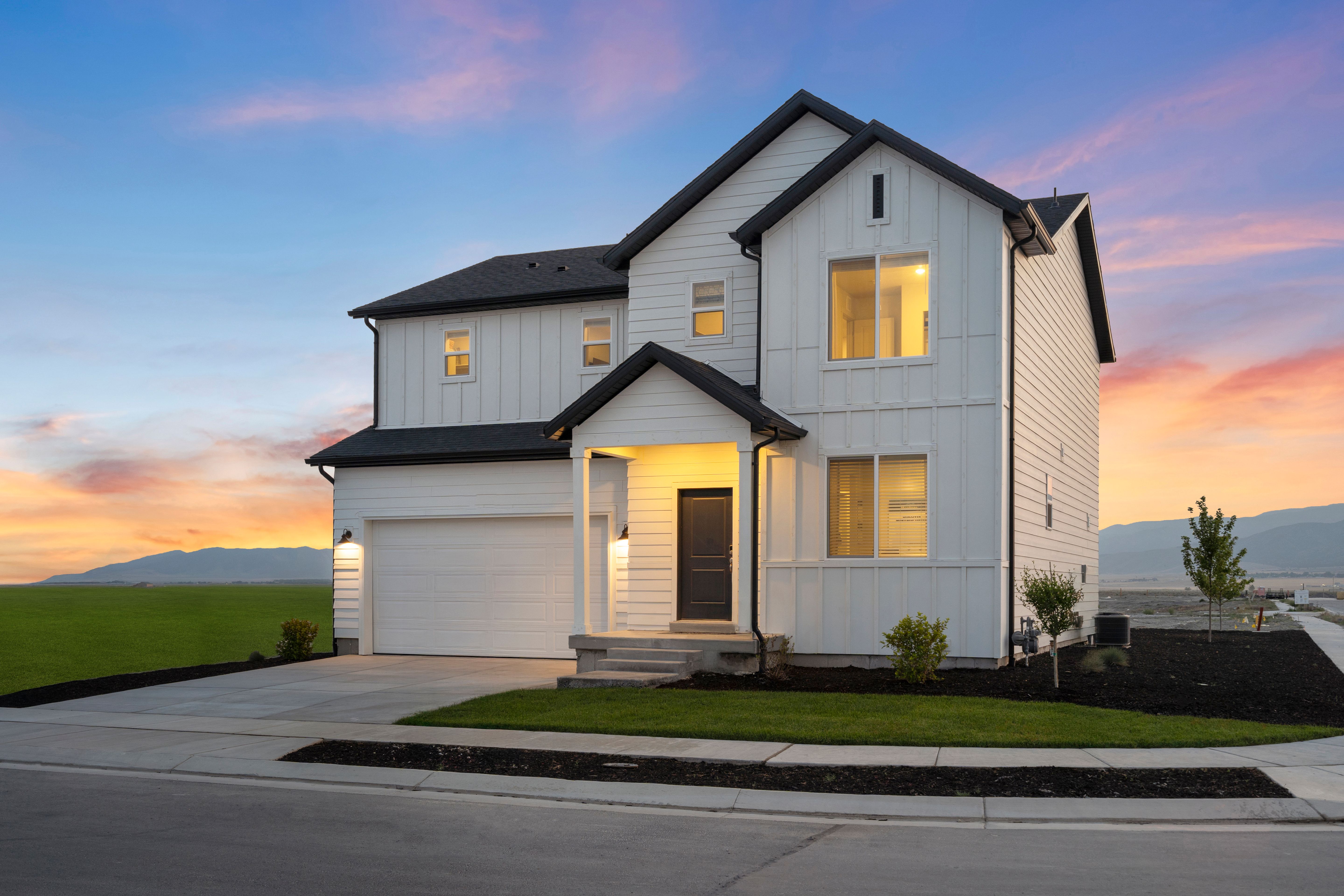 The Pine floorplan exterior image taken at a Meritage Homes Community in Eagle Mountain, UT.