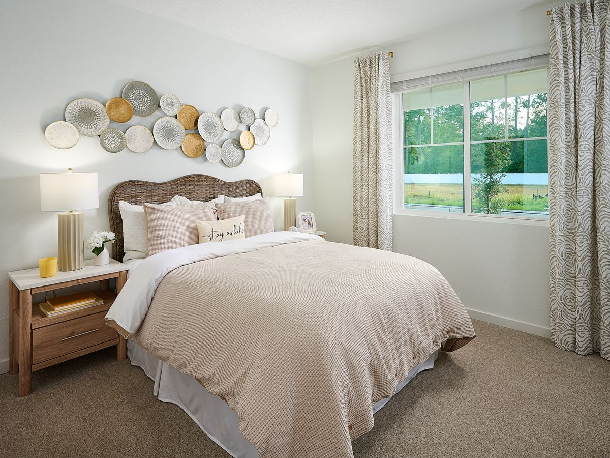 The Jasmine floorplan secondary bedroom modeled at Azalea Creek.