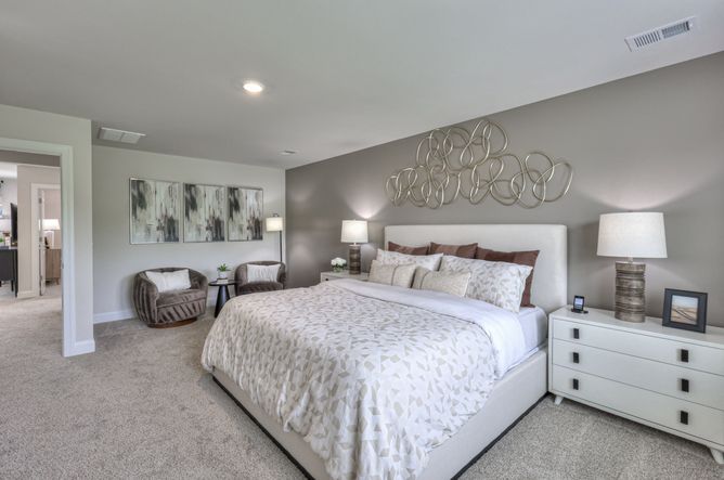 Enjoy privacy in the upstairs primary suite.