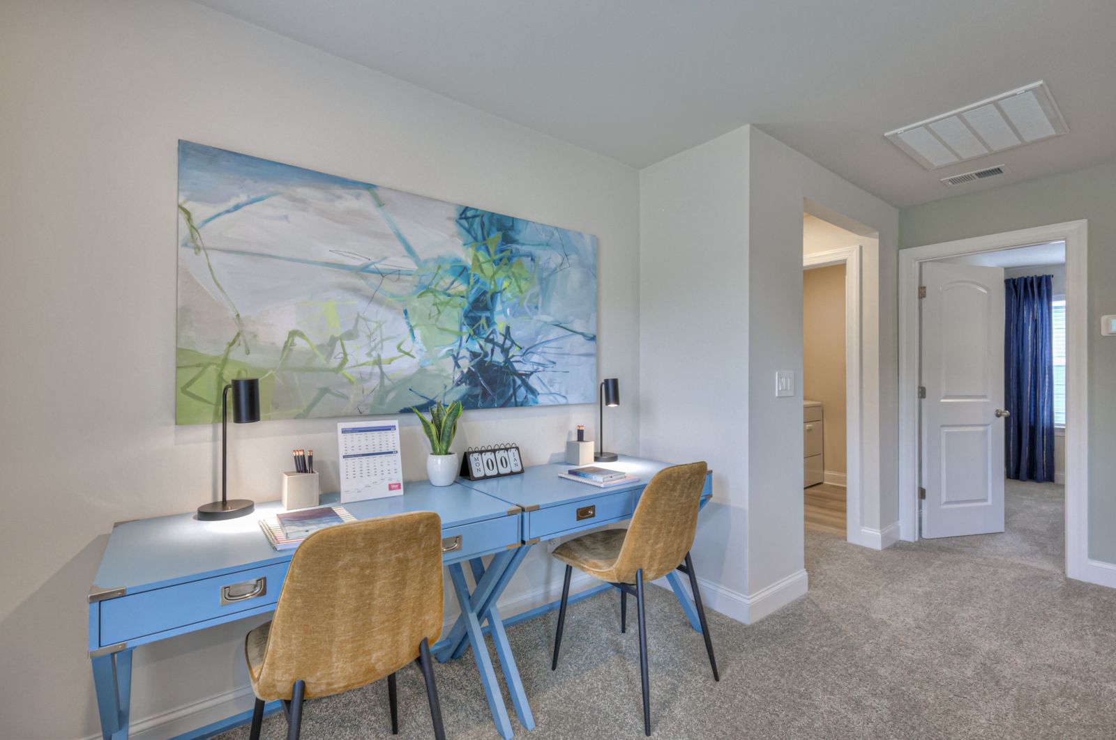 The upstairs loft gives kids a place to study.