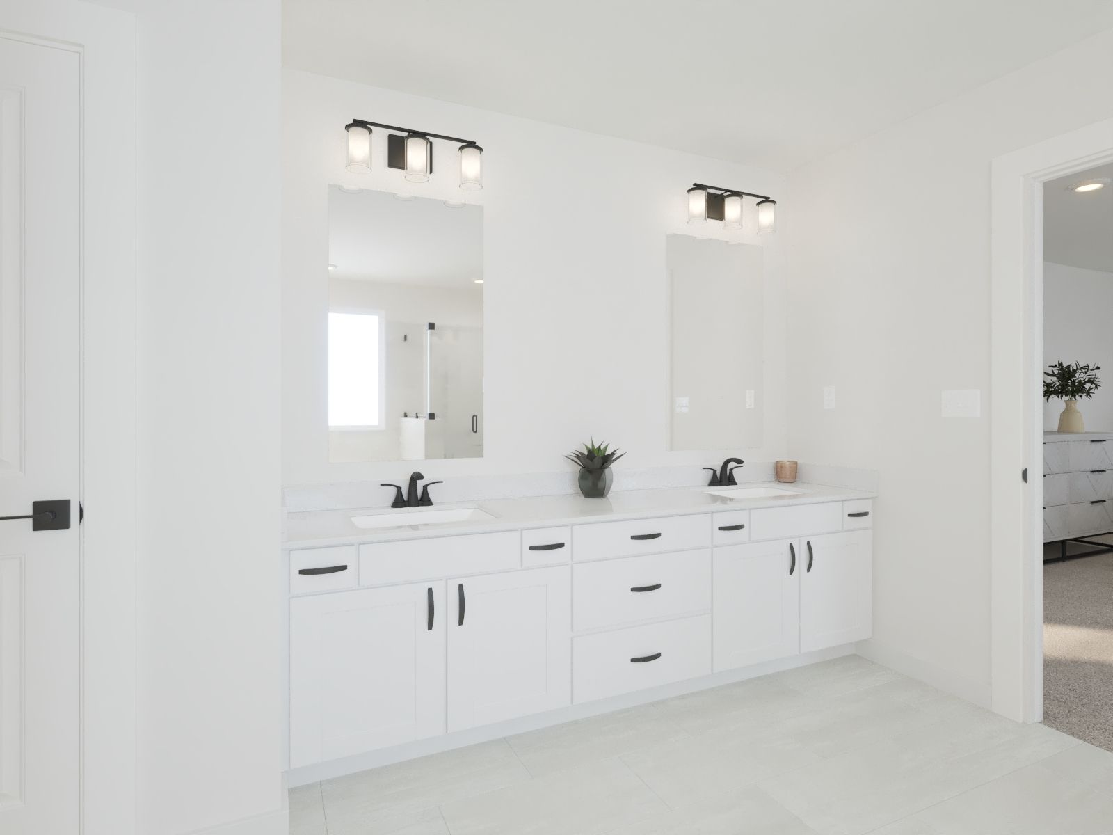 The primary bathroom offers dual vanity sinks and a walk-in shower.