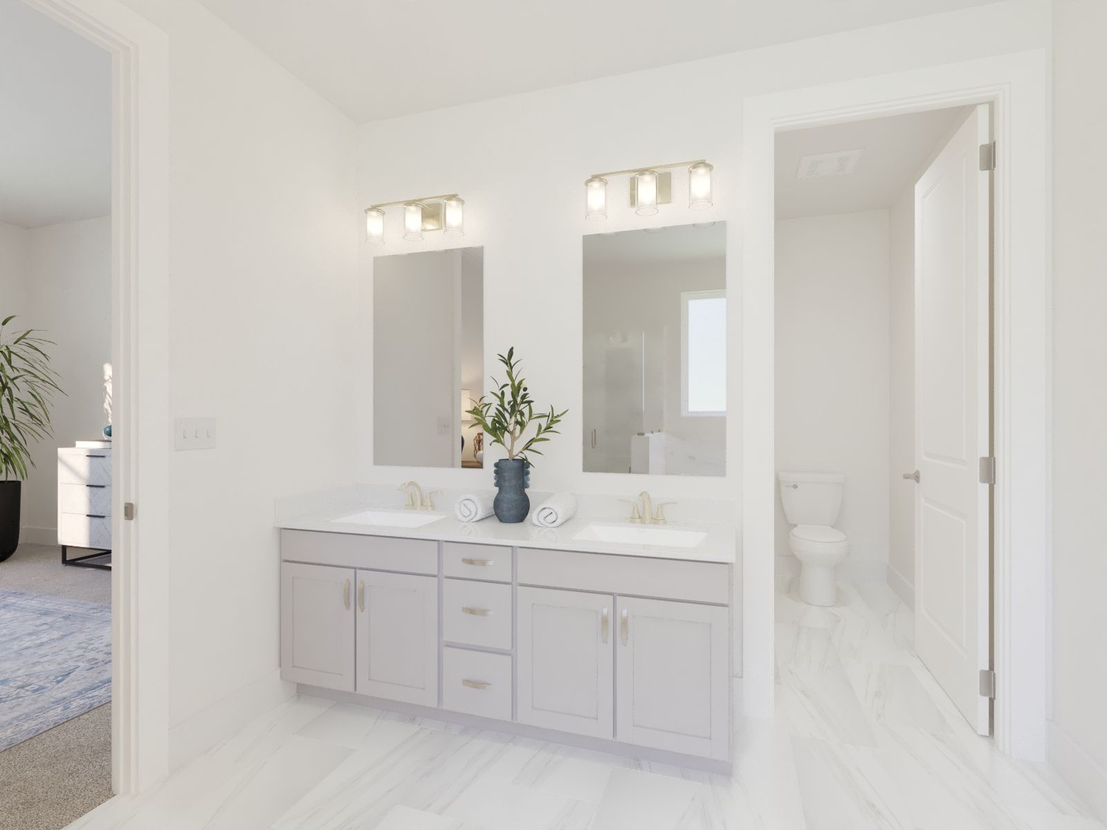 The primary bathroom offers dual vanity sinks and a walk-in shower.