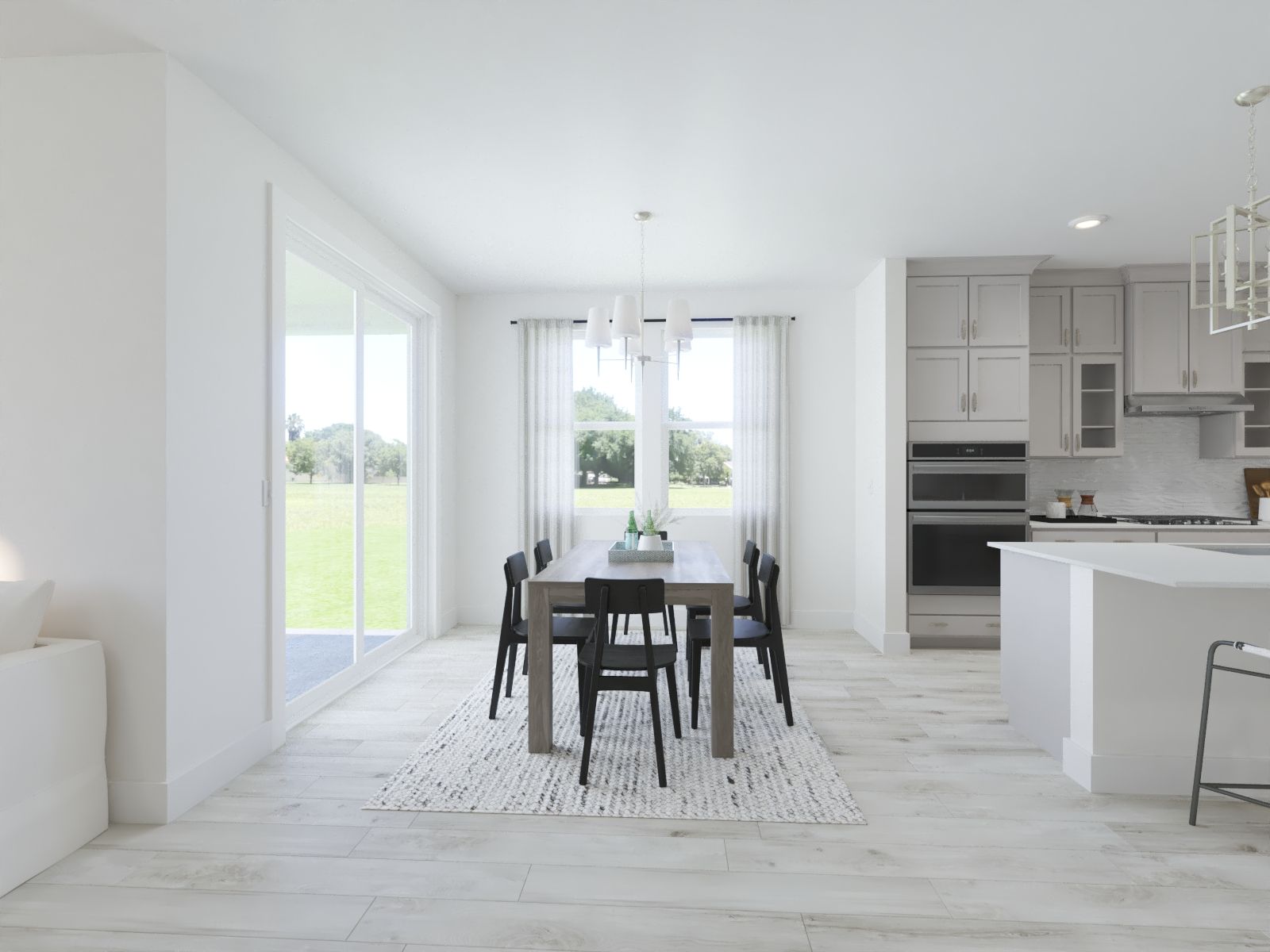 The open-concept floorplan allows for an easy flow between the kitchen and dining areas.