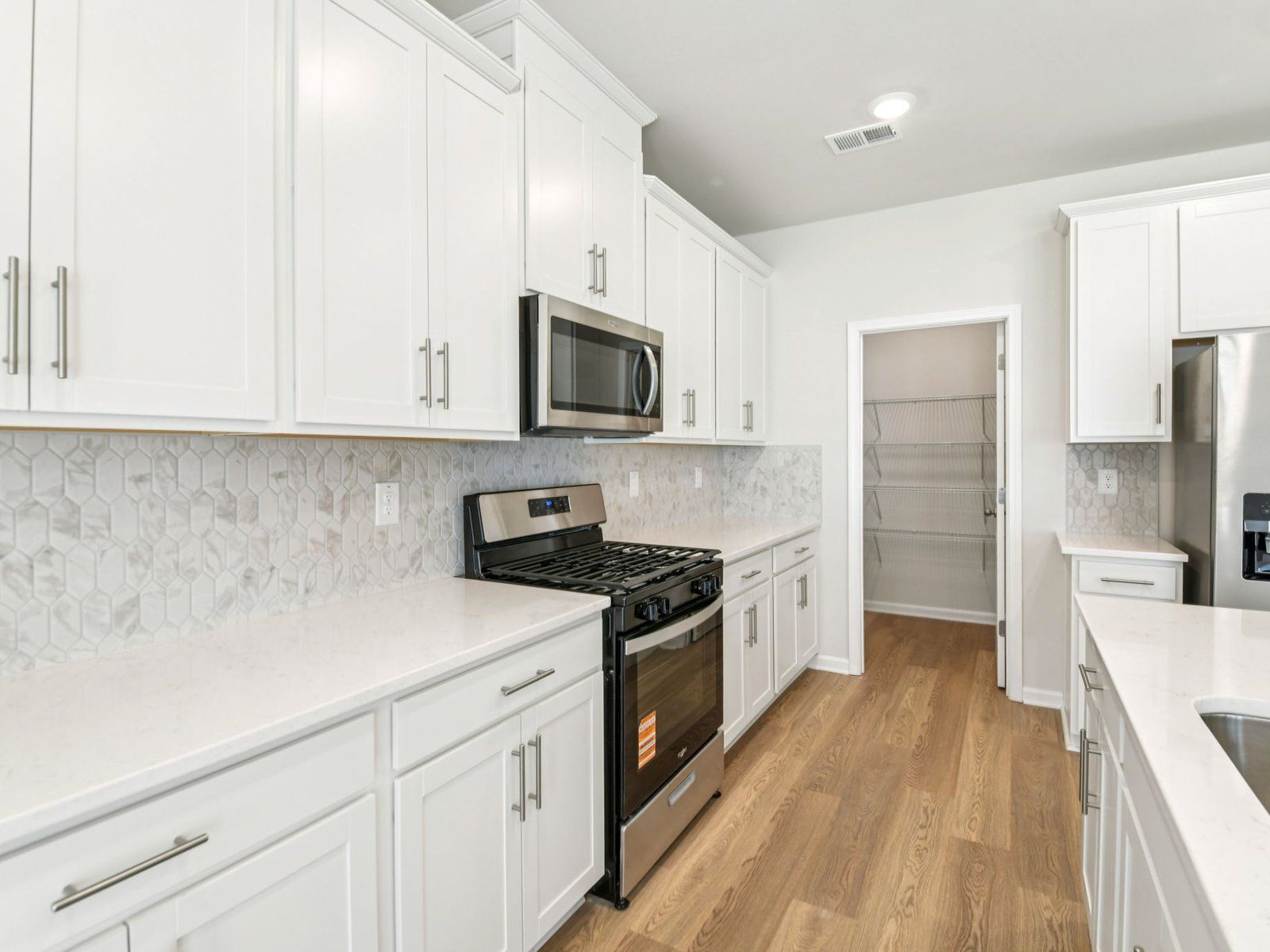 The Johnson floorplan with the Breezy Organic Linen interior package.
