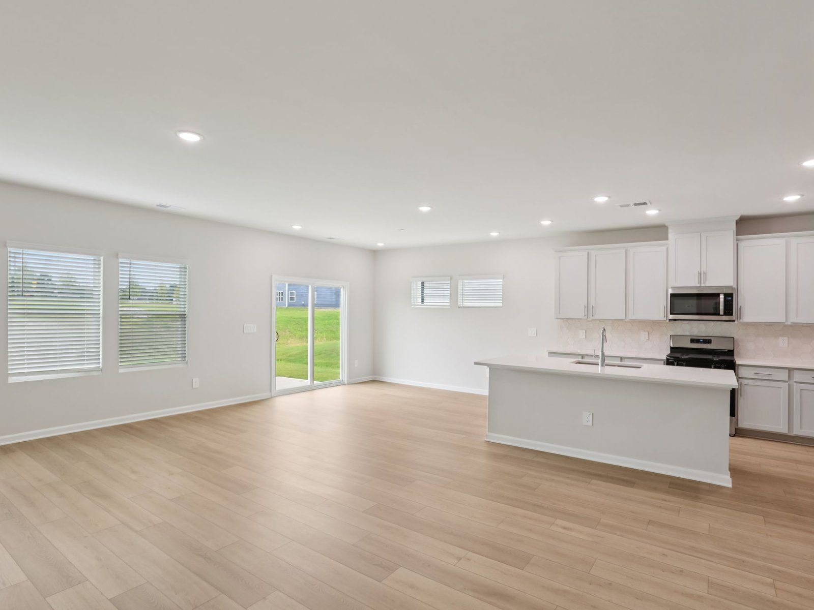 Great room in the Johnson floorplan at a Meritage Homes community in Angier, NC.
