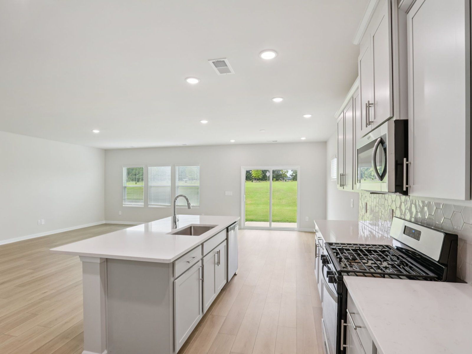 Kitchen in the Johnson floorplan at a Meritage Homes community in Angier, NC.
