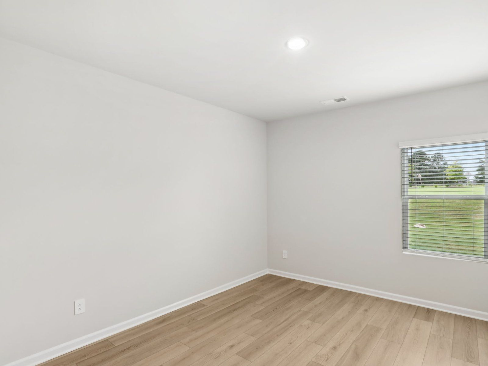 Secondary bedroom in the Johnson floorplan at a Meritage Homes community in Angier, NC.