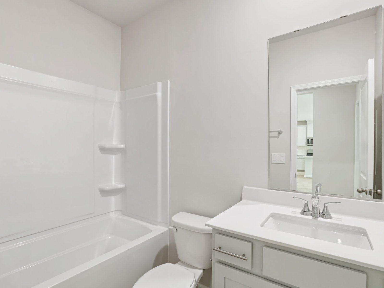Secondary bathroom in the Johnson floorplan at a Meritage Homes community in Angier, NC.