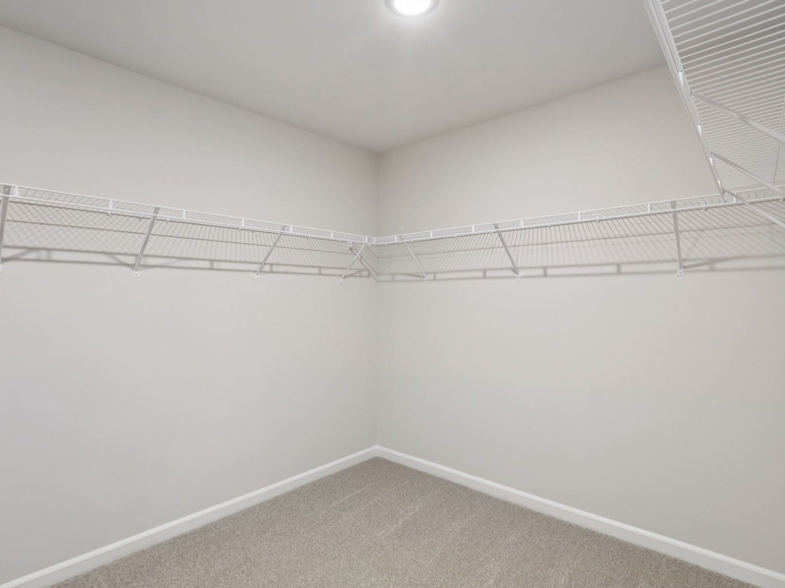 Walk-in Closet in the Jonhson floorplan at a Meritage Homes community in Angier, NC.
