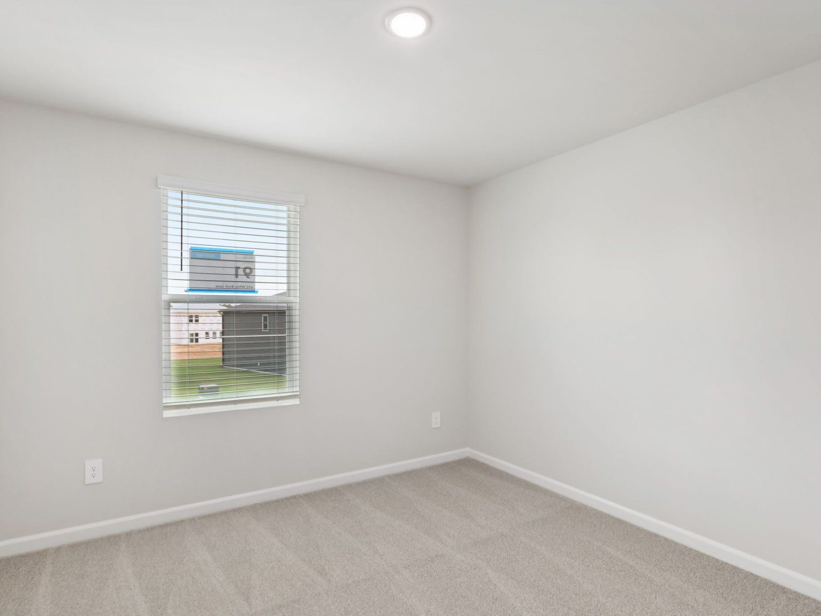 Secondary bedroom in the Johnson floorplan at a Meritage Homes community in Angier, NC.