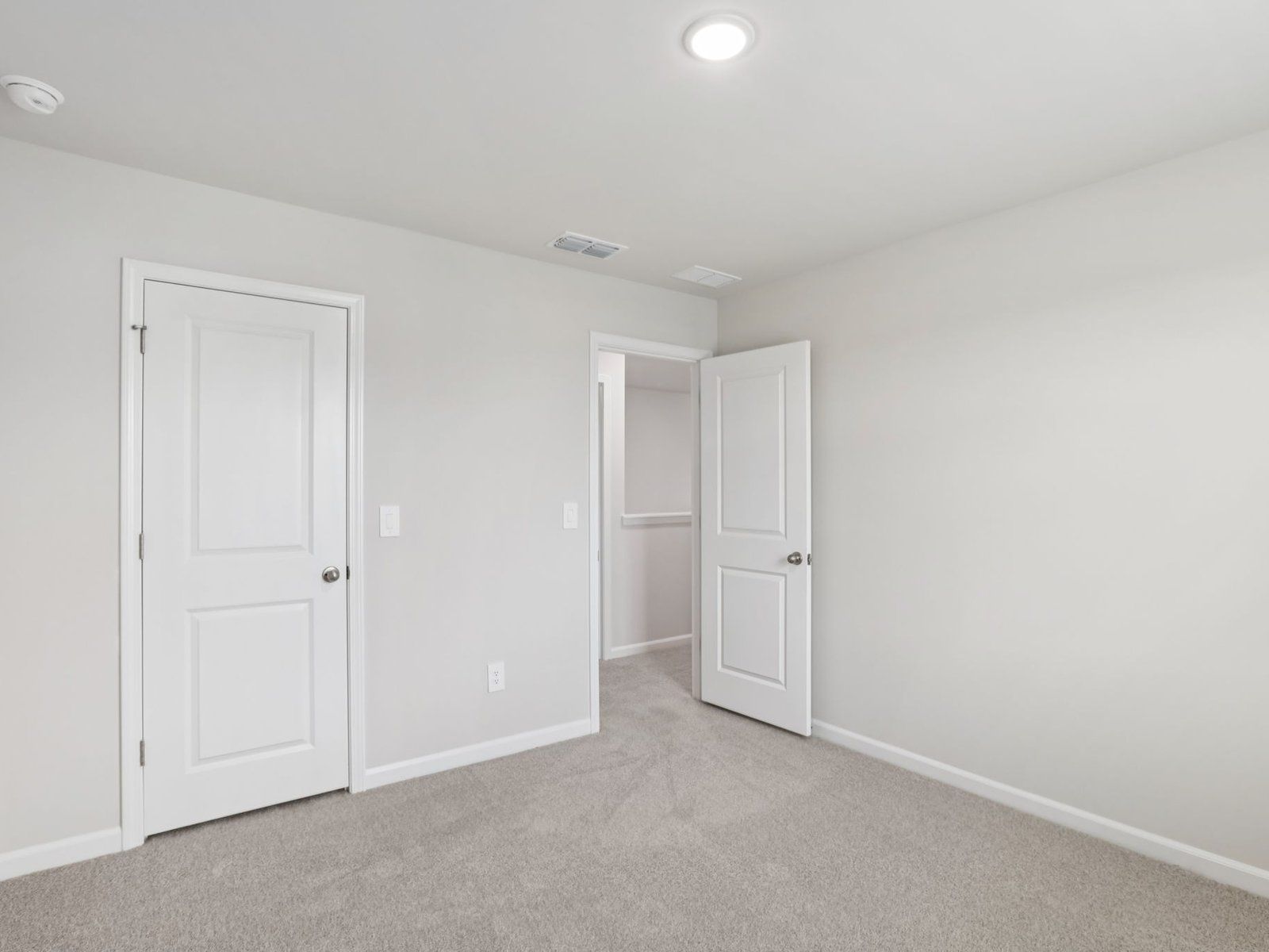 Secondary bedroom in the Johnson floorplan at a Meritage Homes community in Angier, NC.