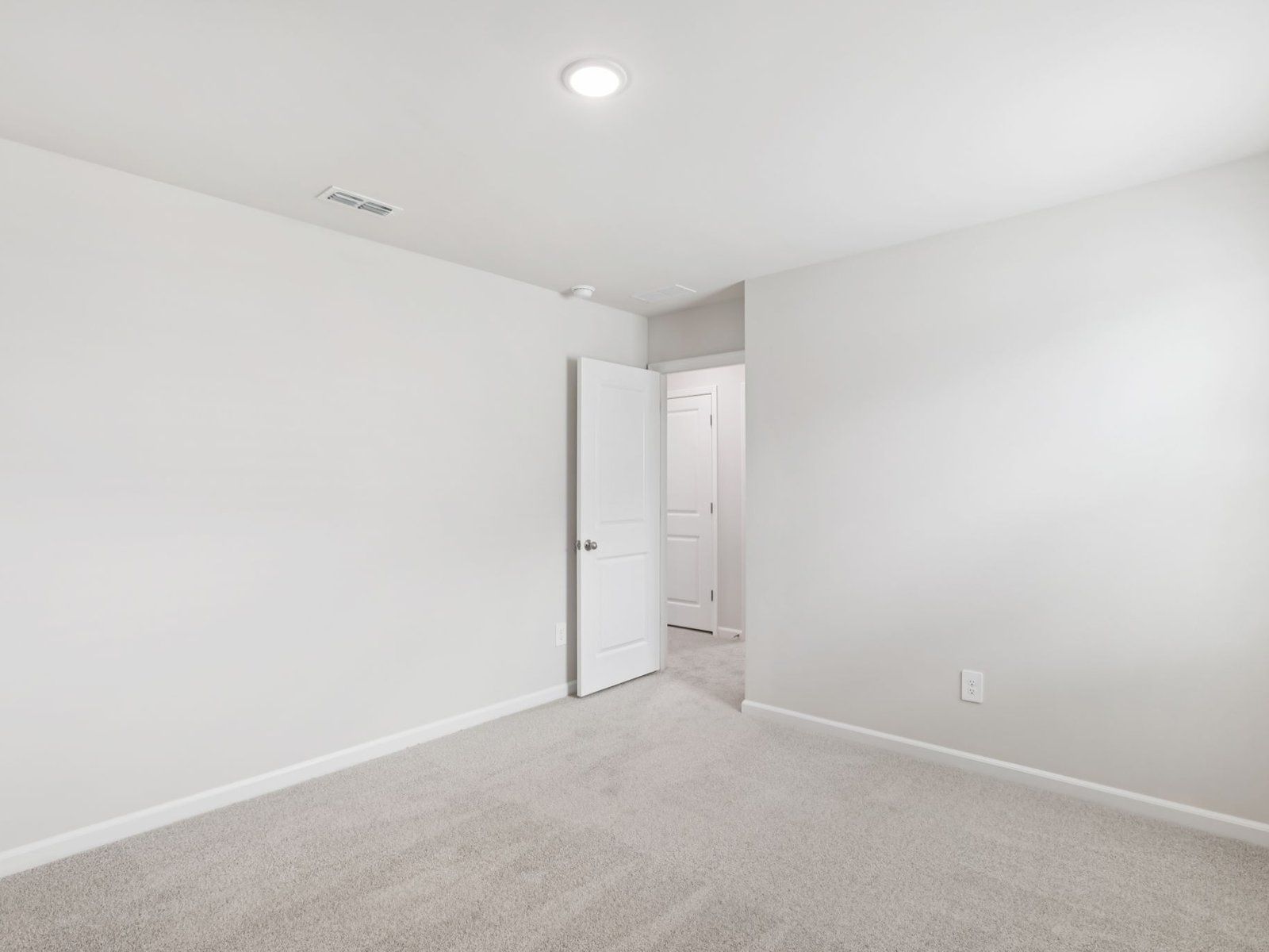 Secondary bedroom in the Johnson floorplan at a Meritage Homes community in Angier, NC.
