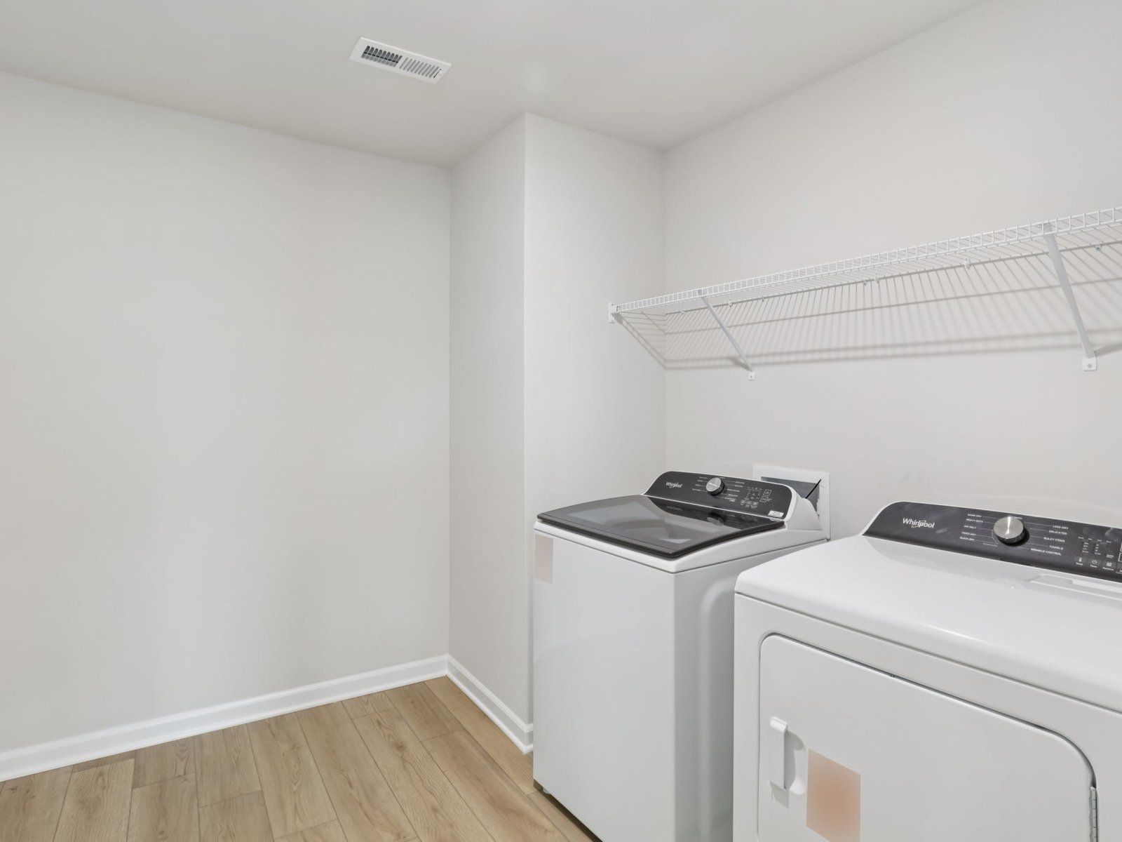Laundry room in the Johnson floorplan at a Meritage Homes community in Angier, NC.