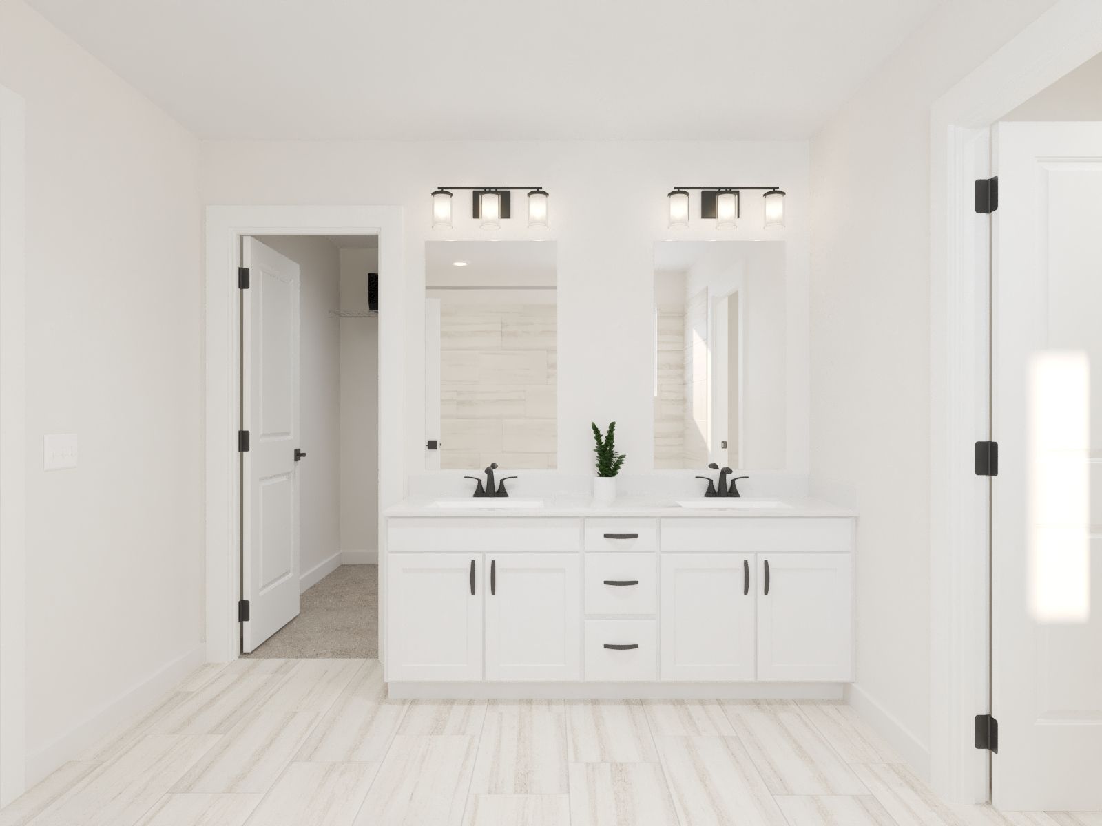 The primary bathroom offers dual vanity sinks and a walk-in shower.