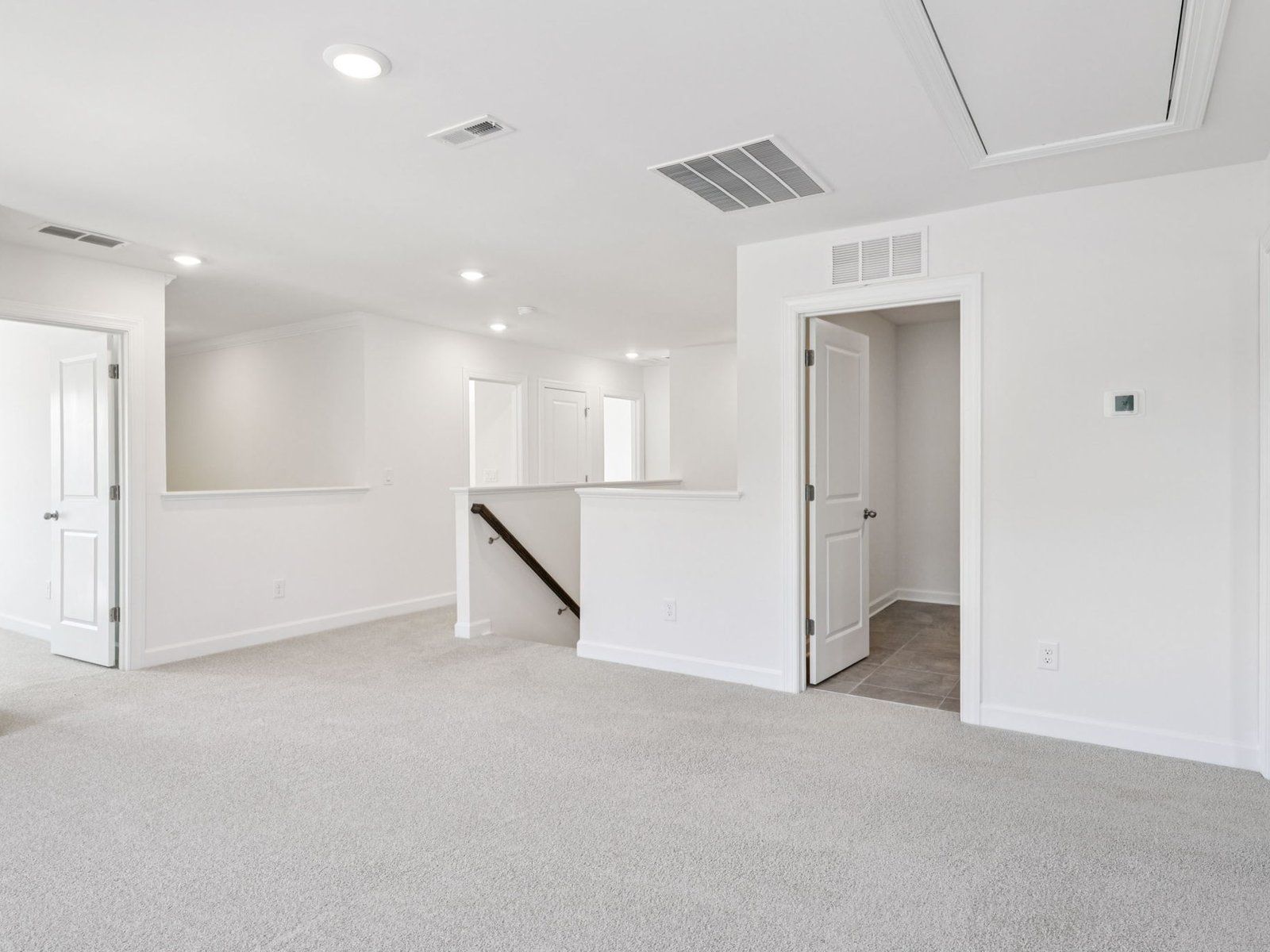 The loft conveniently leads to each upstairs bedroom.