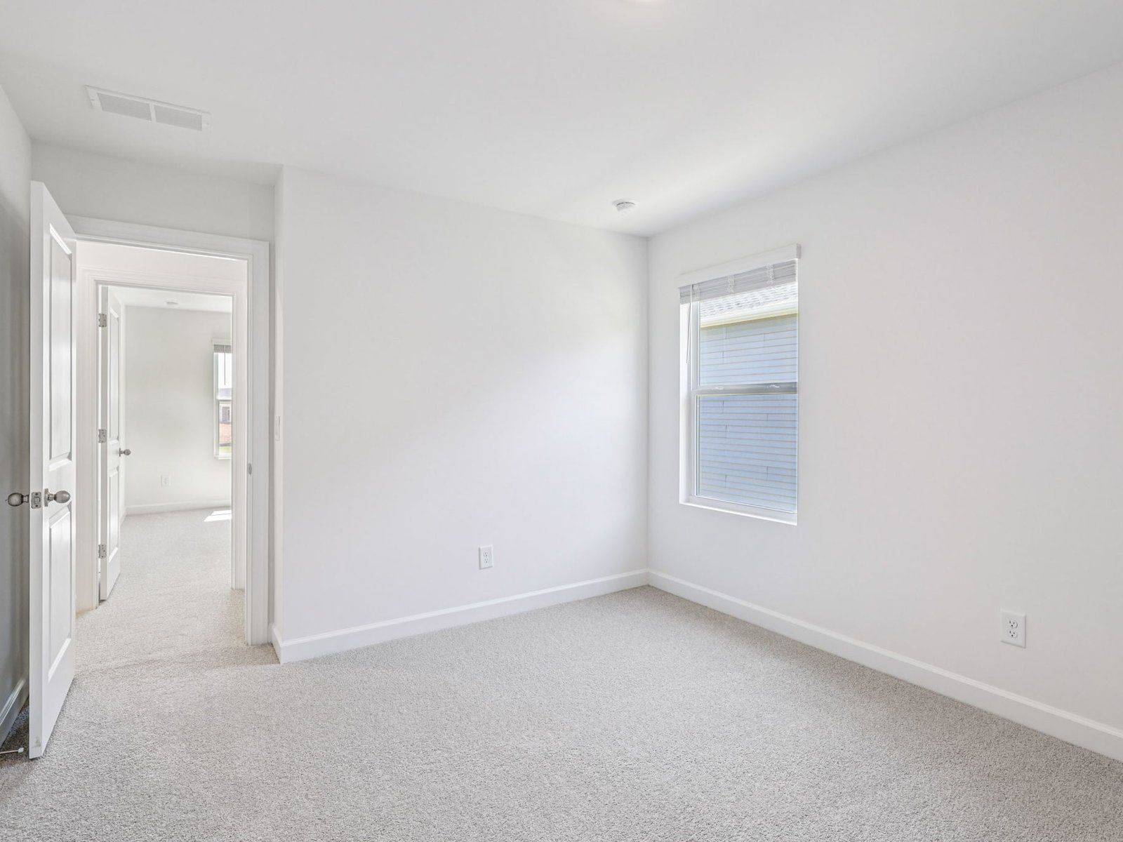 Turn a secondary bedroom into a private space for guests and visitors.