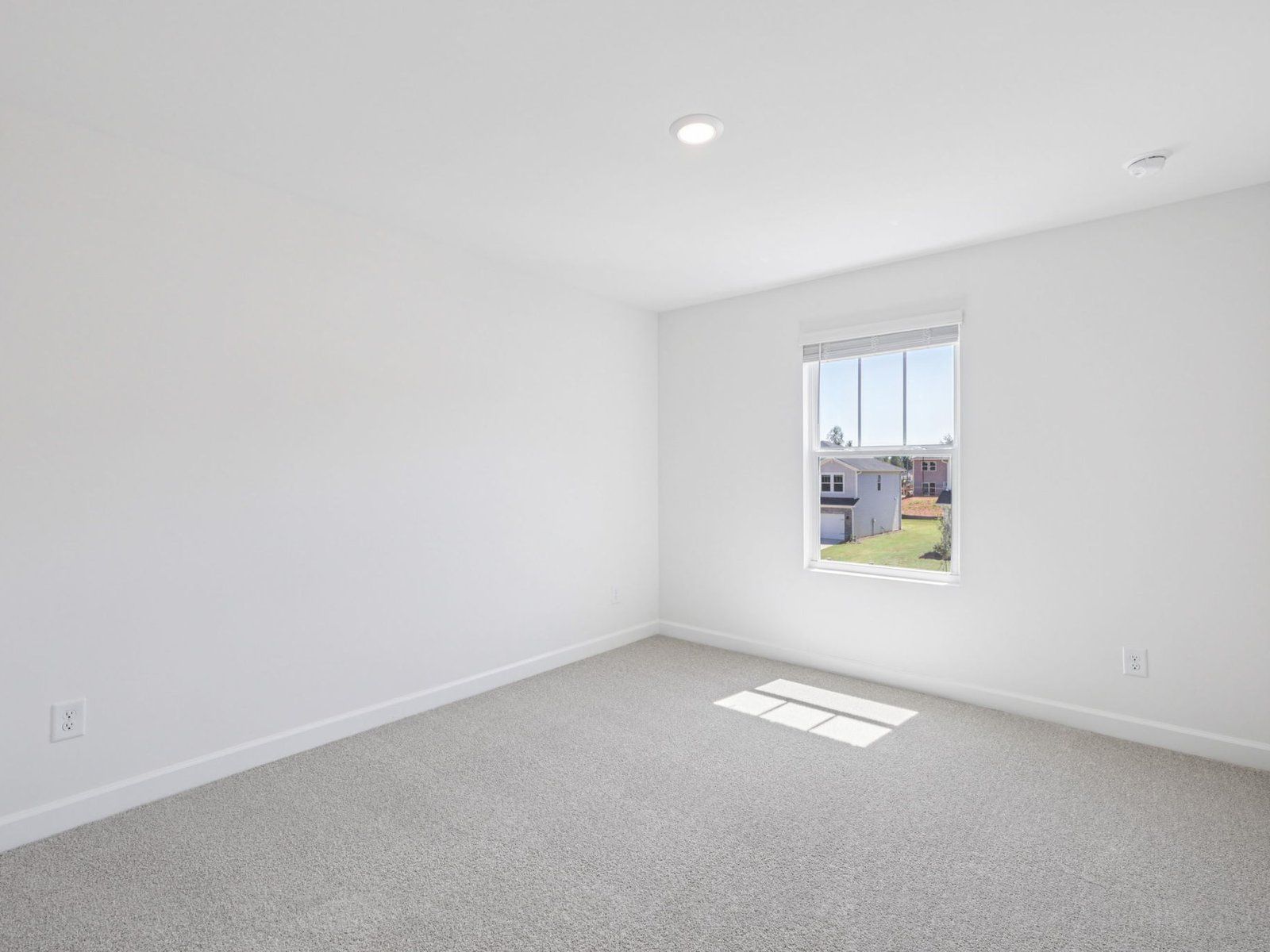 This secondary bedroom is perfect for your home office.