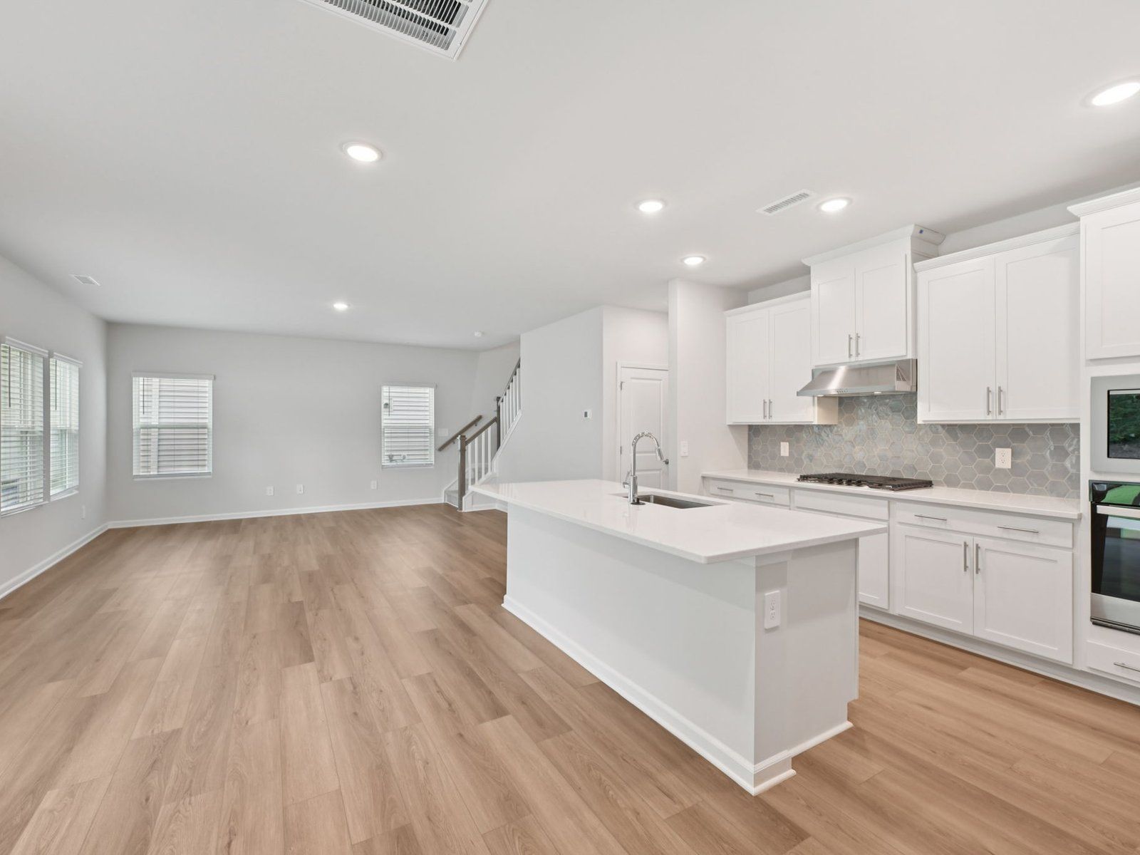 Kitchen in the Brentwood floorplan at a Meritage Homes community in Garner, NC.